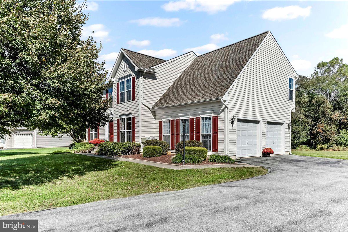 Welcome to 126 Hemlock Dr in sought-after Country Walk Estates. This original-owner home is beautifully set amid mature landscaping and established perennial plantings, offering timeless curb appeal and a peaceful setting.

The interior opens to a bright foyer with hardwood floors and a vaulted ceiling. Formal living and dining rooms provide elegant entertaining space, with the living room offering flexibility as a home office or potential first-floor bedroom.  Hardwood flooring continues through the foyer to a powder room. 

At the heart of the home, the spacious kitchen features abundant cabinetry, a center island, and seamless flow into the sun-filled morning room with expansive windows and sliding doors. The adjacent family room with a fireplace creates a warm, inviting space ideal for gatherings.

Upstairs, four generously sized bedrooms include an extended primary suite with two walk-in closets and a private bath featuring a soaking tub, separate shower, and an enclosed toilet area.  A second-floor laundry adds everyday convenience. 

The partially finished basement provides a versatile living space with a rough-in for a future full bath. Outdoors, enjoy a level backyard backing to 25 acres of preserved green space with walking trails. Numerous updates enhance peace of mind in this turnkey home, ideally located near local amenities and commuter routes.