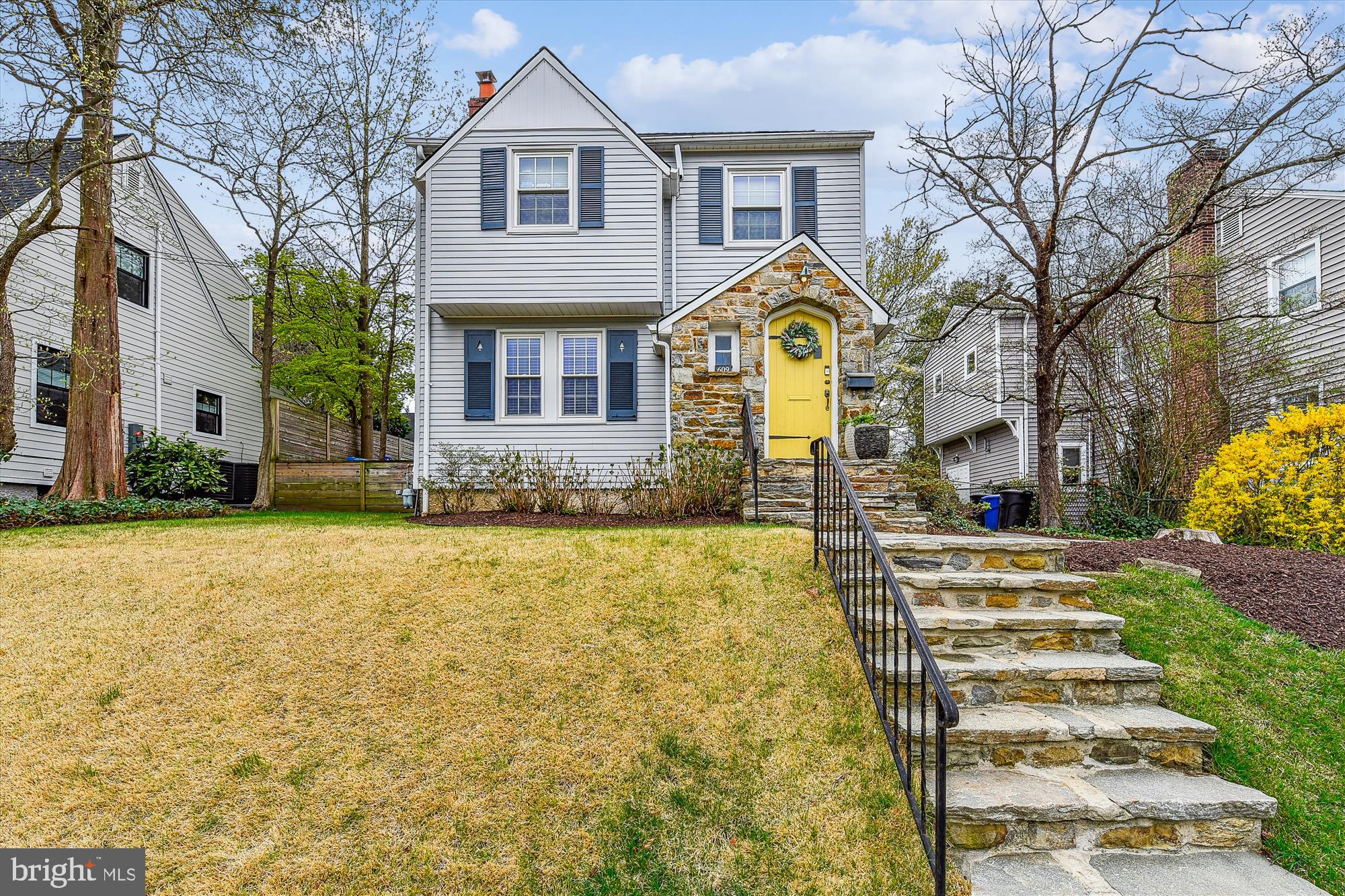 An updated storybook house in West Towson awaits the next chapter of happy buyers. Tasteful farm style Kitchen with an eat up counter, a greenhouse window and shiplap walls opens to a sunny Family Room which spills out to a fenced yard with plenty of room for play and pets. Living Room with fireplace and hardwood floors opens to formal Dining Room. 2 Updated Baths , new windows, roof 2017. HVAC 2020, water heater 2019.  Finished lower level with 1/2 bath. Off street parking in the alley behind the house has a tractor shed with endless possibilities (new shed roof 2025). Dual zone gas heat and A/C. Professional landscaping gives this house an A+ for curb appeal in this sought after location with Blue Ribbon Schools and walkability to park, playgrounds and conveniences.