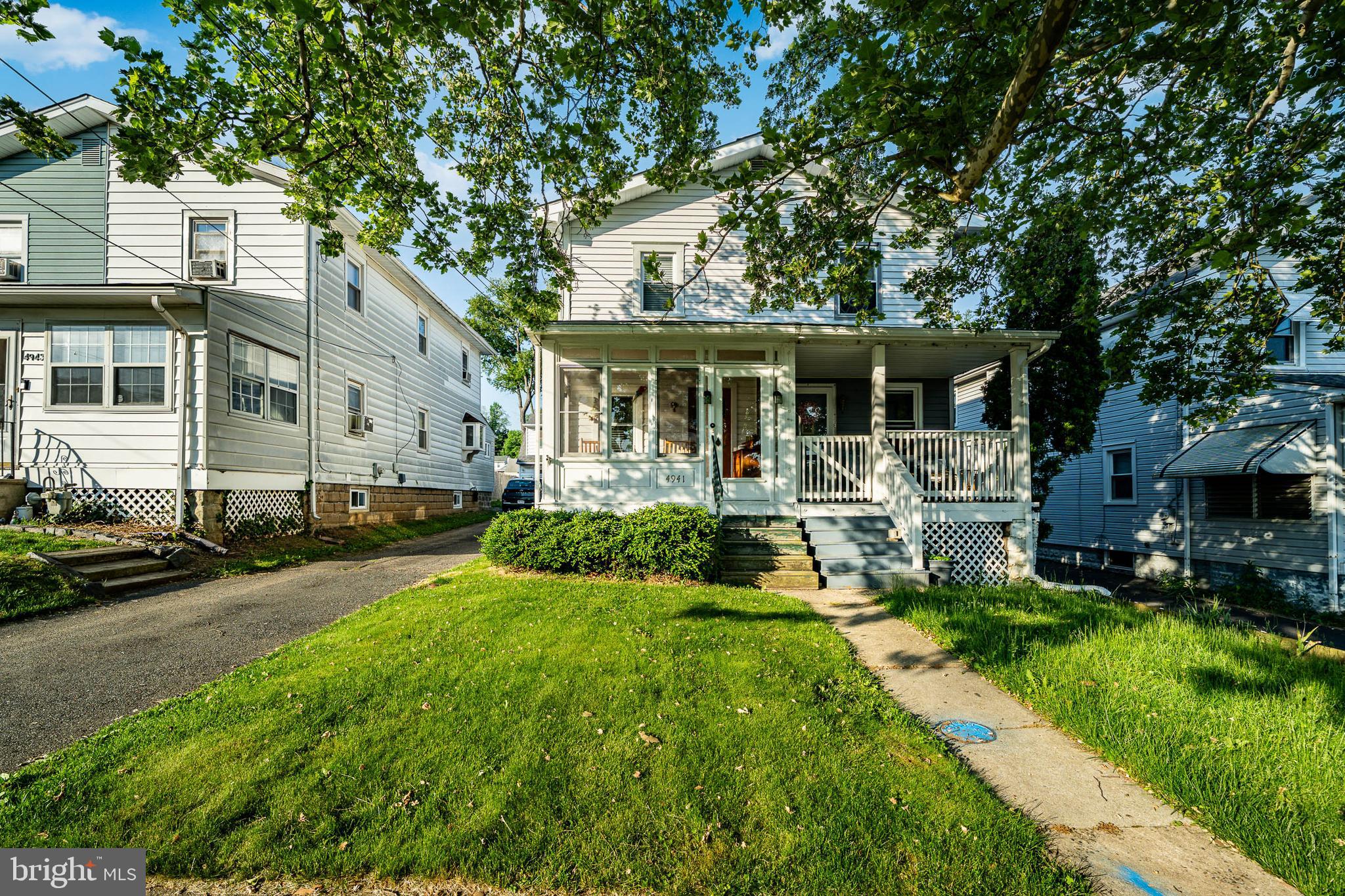 Welcome home to 4941 Greenwood Street, a charming and move-in ready home nestled on a beautiful, tree-lined street in the heart of Brookhaven! From the moment you arrive, the inviting enclosed front porch and sunroom welcomes you, offering the perfect spot for your morning coffee or a relaxing evening. Step inside to discover a bright and airy open floor plan on the main floor, showcasing gorgeous hardwood floors, a breeze-catching ceiling fan, and a highly efficient mini-split system for year-round climate comfort. The updated kitchen is a home chef's delight, complete with crisp white cabinets, ample counter space for meal prep, and a convenient built-in microwave. Upstairs, the second floor features two generously sized bedrooms, both boasting matching hardwood floors and a second dedicated mini-split system to keep the sleeping spaces perfectly cool or cozy. The full hall bathroom is classically styled with a clean pedestal sink. Downstairs, the full, unfinished basement provides massive storage potential alongside a dedicated laundry area, a handy spare toilet, a newer gas water heater, and a reliable gas boiler. With its ideal location, thoughtful modern upgrades, and pristine condition, this lovely home is entirely turnkey and ready for its next owner to make it their own!