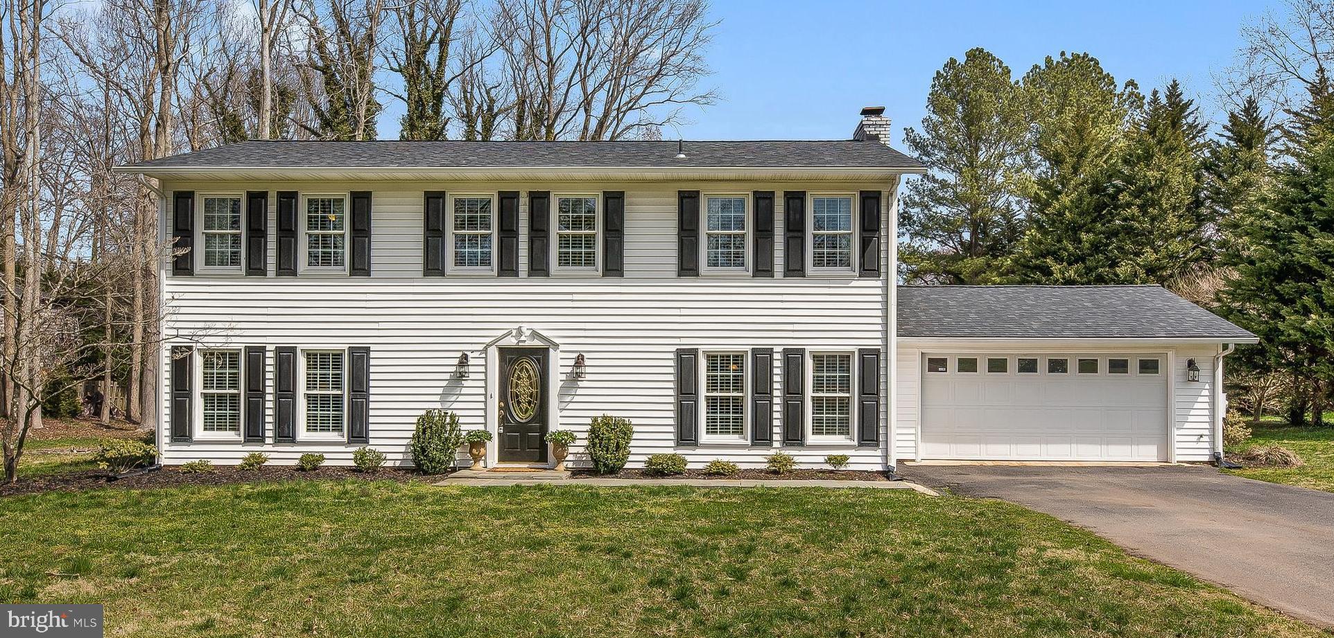 Turn-key colonial in Davidsonville on large lot just under an acre. 4 spacious bedrooms, 2.5 updated designer bathrooms and a stunning gourmet kitchen.  Large island with seating, double wall oven, stainless appliances & beautiful granite counters. Whitewashed brick with wood burning fire place.  New hardwoods throughout main level, new carpeting on bedroom level. Fresh paint and updated lighting throughout.  Great backyardwith flagstone patio and storage shed.  New top of the line water treatment system, newer roof and windows.  Close access to Riva park.