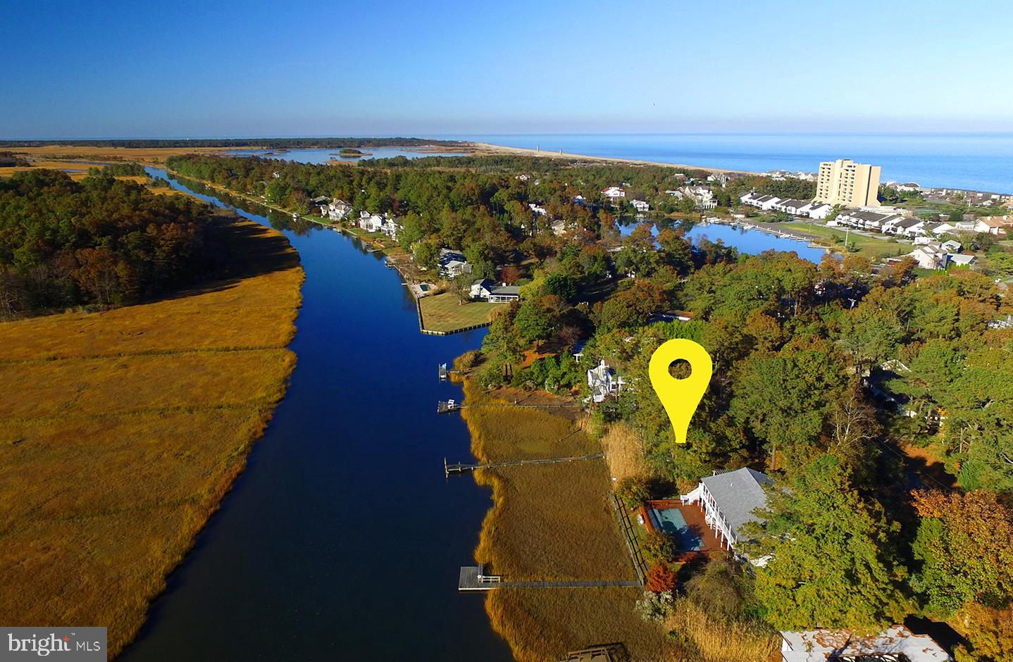 Amazing canal-front building lot in the exclusive community of North Shores that offers stunning views of the Lewes & Rehoboth Canal and incredible sunsets. This is a rare opportunity to build the home of your dreams in a private and scenic setting with your own pier and dock. Enjoy relaxing boat rides down the canal,  kayaking, jet skiing, fishing and more. This building lot provides enough room for a spacious home and pool overlooking the canal and wetlands. North Shores is an amenity-rich community and offers a private beach, beach service, outdoor pool with pool house, tennis courts, marina, private security and more. Just minutes from downtown Rehoboth Beach, enjoy the many shops and restaurants that line Rehoboth Avenue, boardwalk, and adjacent to Cape Henlopen State Park and the entrance of the Gordons Pond Trail.