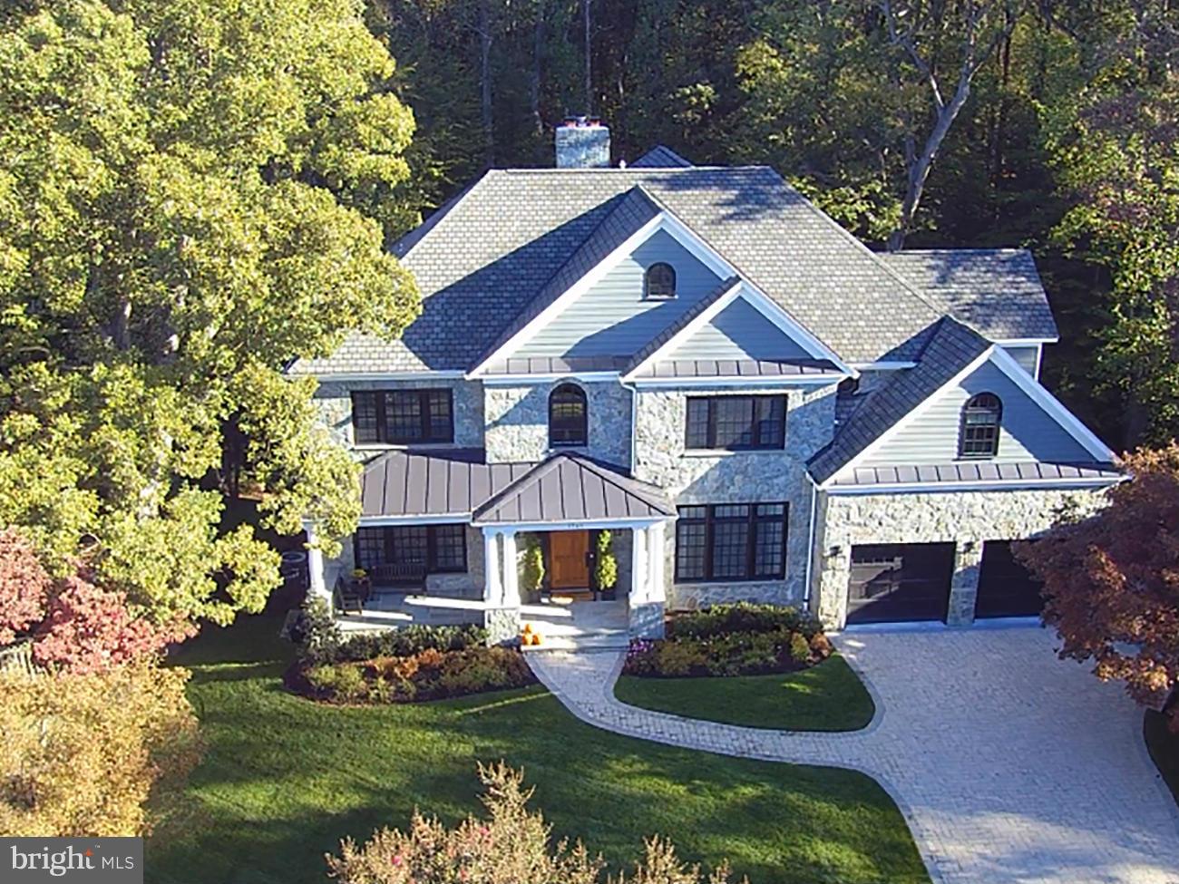 ***Gorgeous Custom Home exhibits attention to detail from the moment you enter.  Kitchen was planned to perfection with Hidden Pantry and Ingenious Appliance sheds. Magnificent Mahogany and Brick Bar and 12 Ft Ceilings in the Lower Level. Heated Stone Floors, Random Width Hardwood, Gorgeous Millwork and Multiple Custom Built-ins. Floor Plans and Additional Photos on Agent Website.