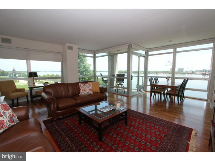 Stop dreaming about water front property, start living! Wake up every morning to the ever changing landscape of majestic blue waters, floating sail boats, fluffy clouds & inspiring bridge views. This lifestyle centric community is devoted to your happiness & well being. Feel your best after working out at the fully appointed gym. Take a dip in the year round indoor pool, lounge on the river deck for a healthy dose of sunshine. Need a change of pace? Take a brisk walk or bike ride on the river walk trail. This 2 bedroom, 2 full bath, 1,500sf flat w/ 1 car parking offers the waterfront experience you imagined. The main living area, with it's floor to ceiling glass windows, looks directly on to the river, bridge, & park. The private glass enclosed walk out deck makes the experience even more amazing. When entering this luxurious space, take notice of the interior private storage room (an upgrade not available in other units). This room, like every closet in the condo, has been professionally fitted with California Closets which more than doubles your storage capacity. Walk through the stylish kitchen expertly finished w/ granite & GE Profile stainless steel appliances & a large breakfast bar that seats 4. This condo has a custom designed laundry room (not available in other units) large enough that it doubles as a beautiful home office space w/ built in cabinetry. The office doors are clear glass allowing for natural light & you will notice that every door is high quality 2 panel wood design. The attention to detail in this home is unmatched. Both bedrooms have fitted walk-in closets and their own bathroom. Bosch W/D. The materials such as marble, Kholer fixtures, & granite make these baths contemporary yet timeless. Back to the main living room where the dining area is nestled amongst clear glass windows that show off the water views. Imagine serving a romantic meal under the soft glow of the Simon Pearce pendant chandelier while watching the sail boats float by. This building is called the Peninsula & it offers security, concierge service, valet, & is personalized to serve your needs as a resident.Common areas include an out-door park, beautifully maintained in-door pool w/ river deck & state of the art gym facility located in the river side Light House building. Waterfront Square loves your dogs too so they've made 2 dog parks & an on site snack Bodega. Heat & Cooling part of condo fee.