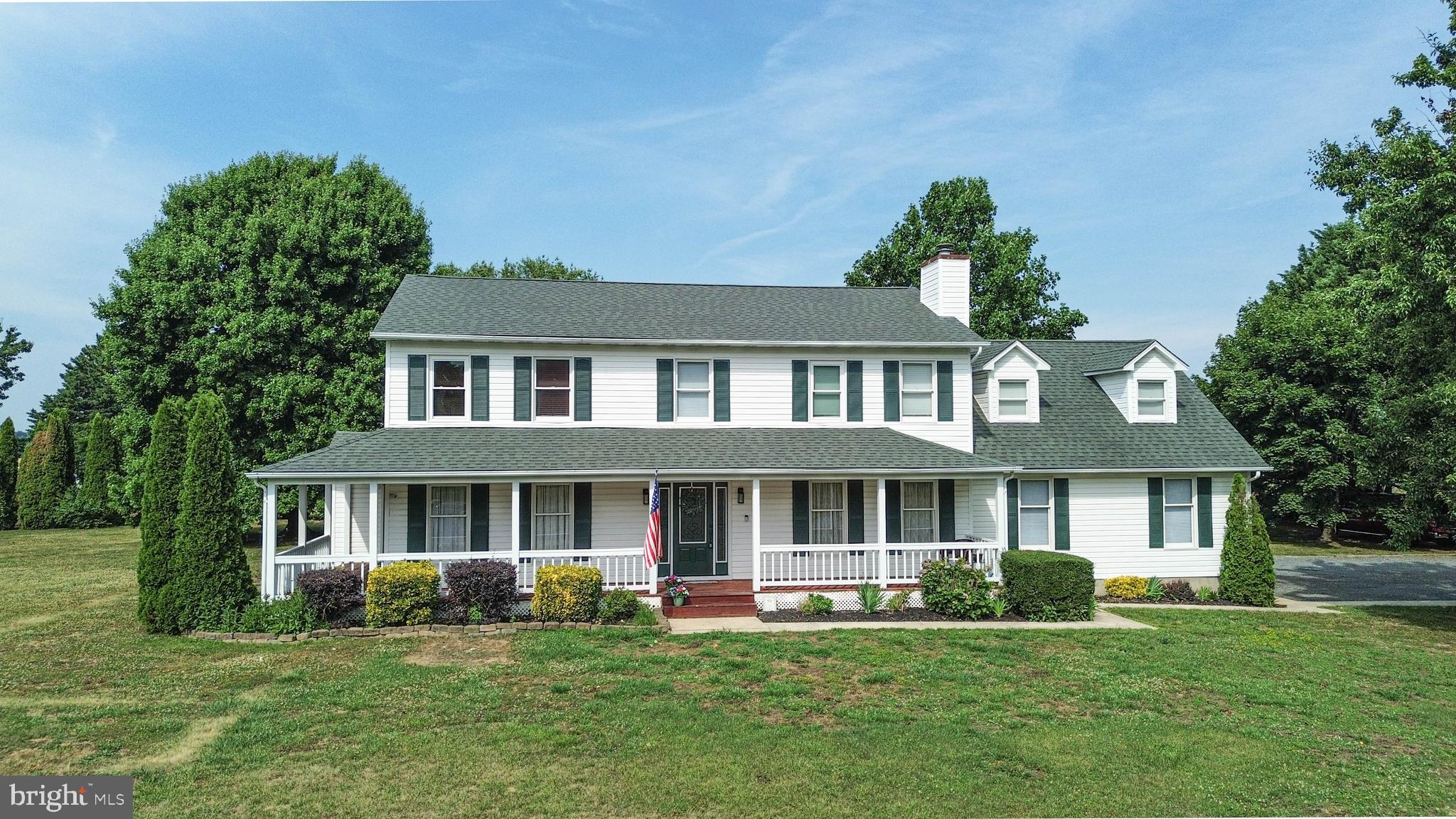 Queenstown - This 4 bedrooms, 2.5 bath home is located between Route 50 and Route 301, so great access to either.  Nice country setting with no HOA.  Bright and open kitchen/family room with also formal living room and dining room.  Spacious bedrooms and a bonus room over the garage.  You will enjoy the wrap around porch and country living, but still close to everything.