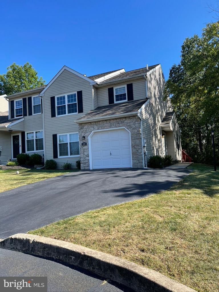 Welcome to this well maintained townhouse in Stonegate.  Located in the North Penn School District and just a few miles from Merck, the home is an end unit with a private side entrance and abuts wooded open space.  It has great living space and storage and is a roomy  3 bedroom, 2.5 bath home. As you enter the hardwood floored hallway you will immediately notice the natural light and convenient layout on the 1st floor: a large living room, a dining room and an open kitchen which expands to a bonus room and a large outside deck. Head upstairs to the large owner's bedroom with vaulted ceiling and ceiling fan.  This bedroom includes a big walk-in closet and a full bath with a stall shower, as well as a soaking tub for relaxing in after a stressful day. Completing the upstairs are 2 additional bedrooms, a main hall full bath with a tub/shower and the laundry area. The full basement is unfinished and is  perfect for an additional play area, storage or for working on projects. Included is an attached 1 car garage and a bonus of 2 outside parking spaces in the driveway, as well as additional parking areas for owners and guests. All the lighting has been switched to energy efficient LED lighting. The HOA includes: Common Area Maintenance, Trash, a Tot Lot/Playground, Basketball, Pickle Ball and Tennis courts. Located in Upper Gwynedd Township this townhouse is in a very convenient location: close to major highways, mall shopping and local restaurants. The owner is a licensed Pennsylvania real estate agent.
