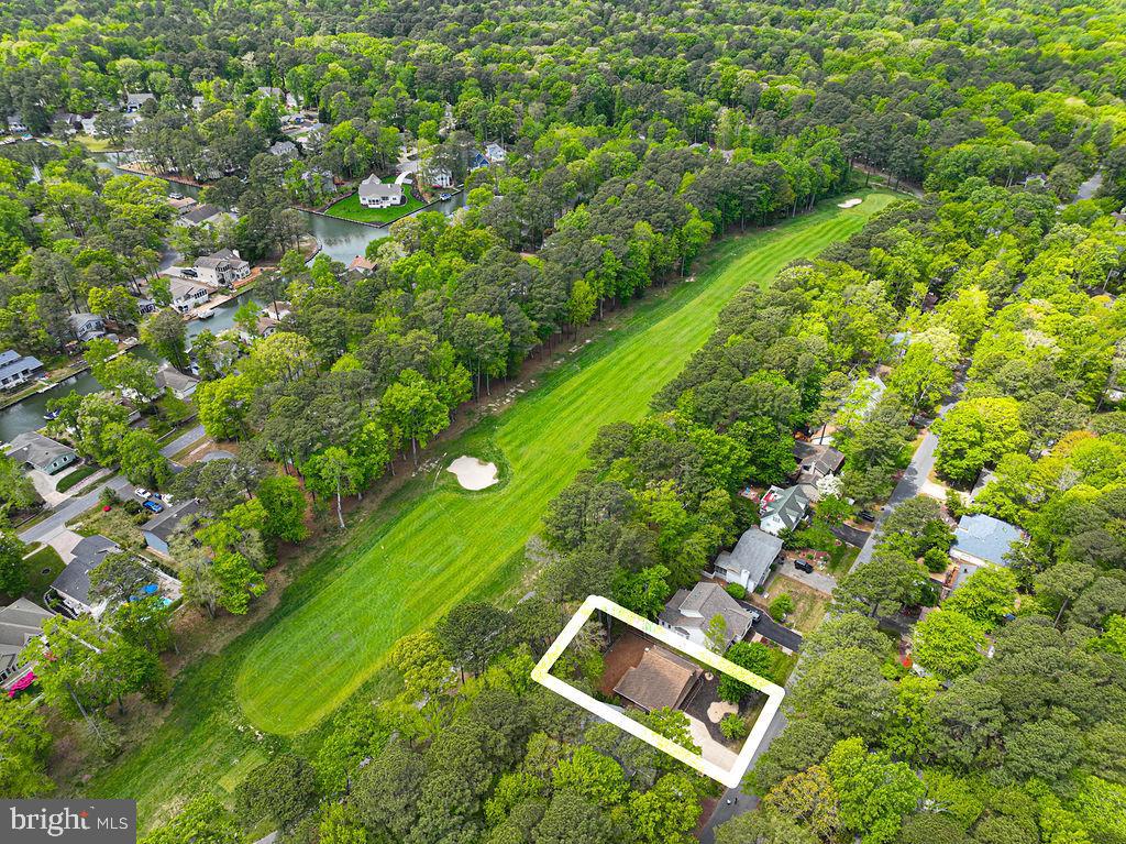 Priced to Sell! An Amazing location perfectly situated on the 4th hole of the prestigious Robert Trent Jones Sr. and within walking distance to the Farmers Market, Gift Shop, Community Clubhouse, Playground, Swim and Racquet Club, Tennis courts and more! Beautifully updated and truly unique Chalet-style home offering 3 bedrooms and 2 full baths, soaring ceilings, open floor plan plus minutes from the beaches of Ocean City, MD. This lovingly maintained home has been extensively renovated over the past four years with a focus on comfort, efficiency, and modern style. The interior features new luxury vinyl plank flooring on the main level, brand-new wall-to-wall carpet upstairs and on the stairs, fresh paint and caulking throughout, new 6-panel interior and closet doors, updated baseboard trim, and stylish new light fixtures. A sleek electric fireplace adds warmth and charm to the living space.
The kitchen is fully updated with a complete suite of new stainless steel appliances, along with a convenient stackable front-load washer and dryer. Both bathrooms have been refreshed , while additional improvements include all-new double-pane windows with plantation blinds and new front and rear exterior doors. Major system upgrades provide peace of mind, including a new HVAC heat pump, crawl space has been updated with dehumidifer and sump pump , Mitsubishi mini-split system for the second floor, new hot water heater, and a whole-home water filtration system.  Step outside to enjoy a host of exterior upgrades, including a new deck, new scalloped fence (2025), new cement driveway, new concrete carport floor, and a beautifully landscaped perimeter walkway (2025). The home also features 6-inch gutters with leaf guards, professionally trimmed trees, and an enclosed entryway leading to the expansive  screened porch for added usability. Carport could be enclosed to become a one car garage. With its prime golf course location and extensive upgrades throughout, this move-in ready home offers exceptional value in one of the area’s most desirable communities. Whether you are looking for a primary, second home or investment property this one has it all so schedule your private showing today before it’s gone!