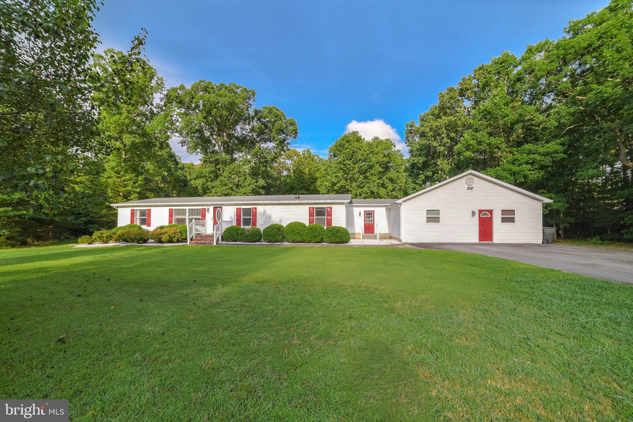 Looking for a peaceful and tranquil setting.....well here it is!  This Rambler sits on 3 acres and is ready for a new owner.   This home has 4 bedrooms and 3 full bathrooms and  has been meticulously maintained.  Updated throughout the last few years to include the kitchen, roof, heat pump, and new carpet in 2022.   Open concept living include the kitchen w/bar style  counter seating., living & dining rooms..   There are two primary bedrooms.  The addition was added in 2012 and includes a handicapped accessible primary bedroom and separate access to outside.  The addition  could be used as an in law suite.  The primary bathroom is  handicapped accessible w/grab bars, wide doors, shower and soaking tub.  The large deck is great for grilling and entertaining.   A fenced yard that backs to trees for added privacy, shed, detached shed w/dual garage doors, and gazebo complete the back yard.  Close to shopping, schools and area amenities.  Easy commute to Webster Field, PAX Naval Base, and St. Mary's City.  Schedule your appointment today.
