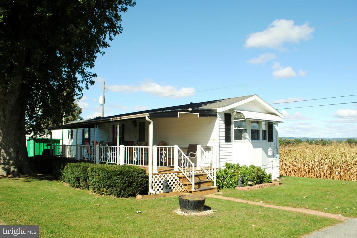 FARMLAND VIEWS! Quiet little community just outside of New Holland. Surrounded by Amish farmland. Original owners! Lived on this lot for 35 years in previous mobile. Covered porch and new roof about 10 yrs ago with 25-yr shingles. New stove/refrigerator and insulated windows. Total electric home -Avg electric bill is $80-HIGHEST $133/mo. Park bills for water/sewer use. Pet friendly, $10 per dog. 1984 Schult 14x68 ''Citation''. see 23 pics!