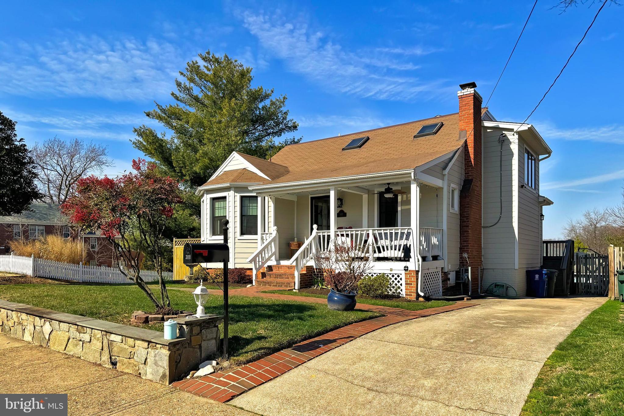 Welcome home to 300 Ashby--a quintessential recently expanded and renovated 4 bedroom/3.5 bath circa 1935 Del Ray bungalow.   Walk the flagstone path to the inviting front porch--the perfect perch to watch the world go by with a glass of wine or cup of coffee.  Once inside, you will appreciate the impeccable marriage of old and new.  Warm wood floors, a cozy fireplace, some original interior doors,  hardware and tile will remind you of a bygone era.  The stunning open floor plan with a modern gourmet kitchen, generous dining area, built-in  butler's pantry, an adjoining bonus room and two bedrooms with a shared full bath, mud room and rear porch with awning complete the main floor. The upper level boasts two bedrooms, both with en-suite full bathrooms.  The primary bedroom has vaulted ceilings, a walk in closet and can easily accommodate a king sized bed and furniture suite. The other upper bedroom would make a perfect guest bedroom, nursery, office or bonus living area.  In the finished lower level, you will find a large improved  walk-out basement currently used as a home gym area adjoining an entertainer's dream space with a "speak easy" vibe featuring exposed brick, decorative ceiling, handcrafted bar and powder room.  The home's rear yard is fully fenced with a tiered stone patio, "play house" shed and green grassy lawn.  The expansive side driveway can accommodate up to three cars.  Ideally located in North Del Ray--a quick walk to the new Potomac Yard Metro Station as well as the lively eating/drinking/shopping of Mount Vernon Avenue. Quick commutes to DC, Reagan National, The Pentagon and historic Old Town convey.