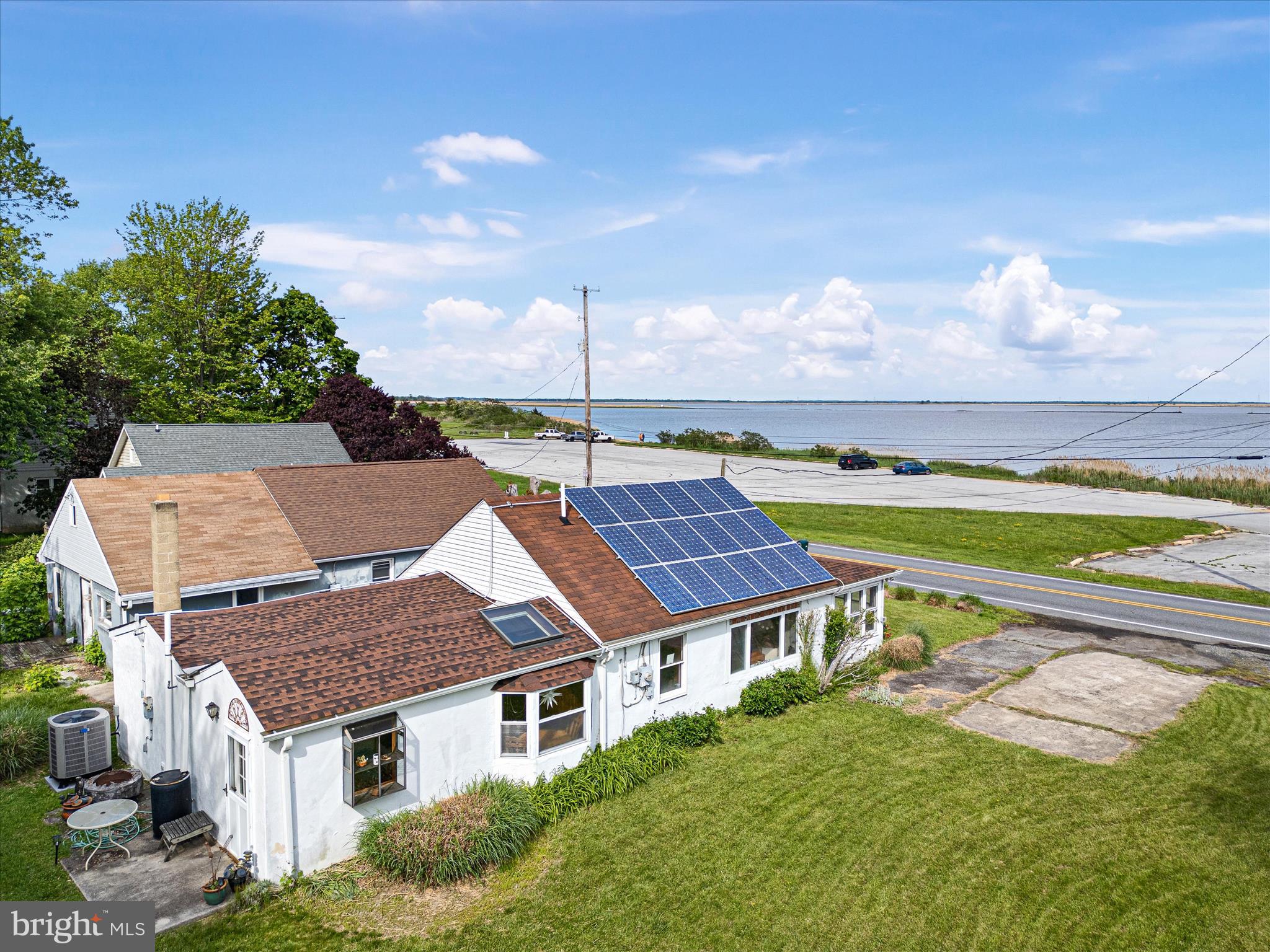 Welcome to your dream getaway at 1871 St Augustine Road, Middletown, DE – a boater, fisherman, or nature enthusiast's paradise! This well-maintained gem is perfectly placed just across the street from a public boat ramp, offering captivating views of the Delaware Bay.

Step inside to find a cozy, fully furnished home featuring 2 bedrooms and 1 bathroom. The kitchen is a charming galley style, adorned with a bay window to soak in those delightful bay views, a skylight for ample natural light, hardwood floors, tile countertops, and oak cabinets. 

Relax in the spacious 3-season porch at the front, perfect for unwinding and enjoying the evening breeze. For those with a green thumb, the property offers a  great gardening opportunity and shed for extra storage. Plus, it comes with an electric lawnmower and two kayaks, ready for your next adventure on the water. Embrace the coastal lifestyle and make this beautiful property your own!  

 New HVAC in 2024. Hot Water Heater replaced in 2023. Partial roof replacement in 2023. Solar panels keep the energy costs low and the home is on Public sewer and a well. Just a short walk to the Augustine Tavern or a quick drive to Port Penn for delicious crabs at Kelly’s!
Offers are due by the end of the day on Monday, May 12th.