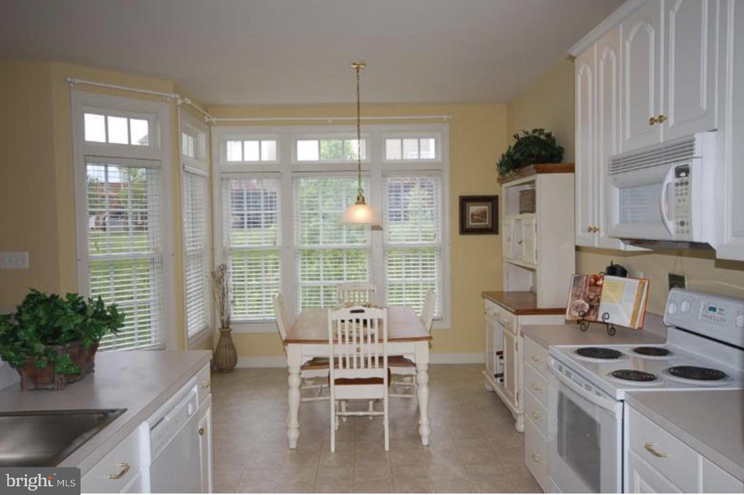 Welcome to Waverly Woods! The public school system is ranked one of the best in the country. Waverly Elementary, Mount View Middle & Marriott’s Ridge High schools! This 3Br, 2.5 Bath, 1 car garage townhome sits right next to Waverly Woods golf course, playground, tennis courts, and community pool. 1st floor plan is open, with fireplace in the living room, stairs to the left and a half bath.  Rear of 1st floor has a large eat in kitchen and rear deck.  Basement is fully finished, with laundry room and lots of storage.  The third floor has 3 bedrooms, a master bath and a hall bath.  Plenty of closet space.  The entire home has brand new paint and refinished flooring. Happy Touring!--