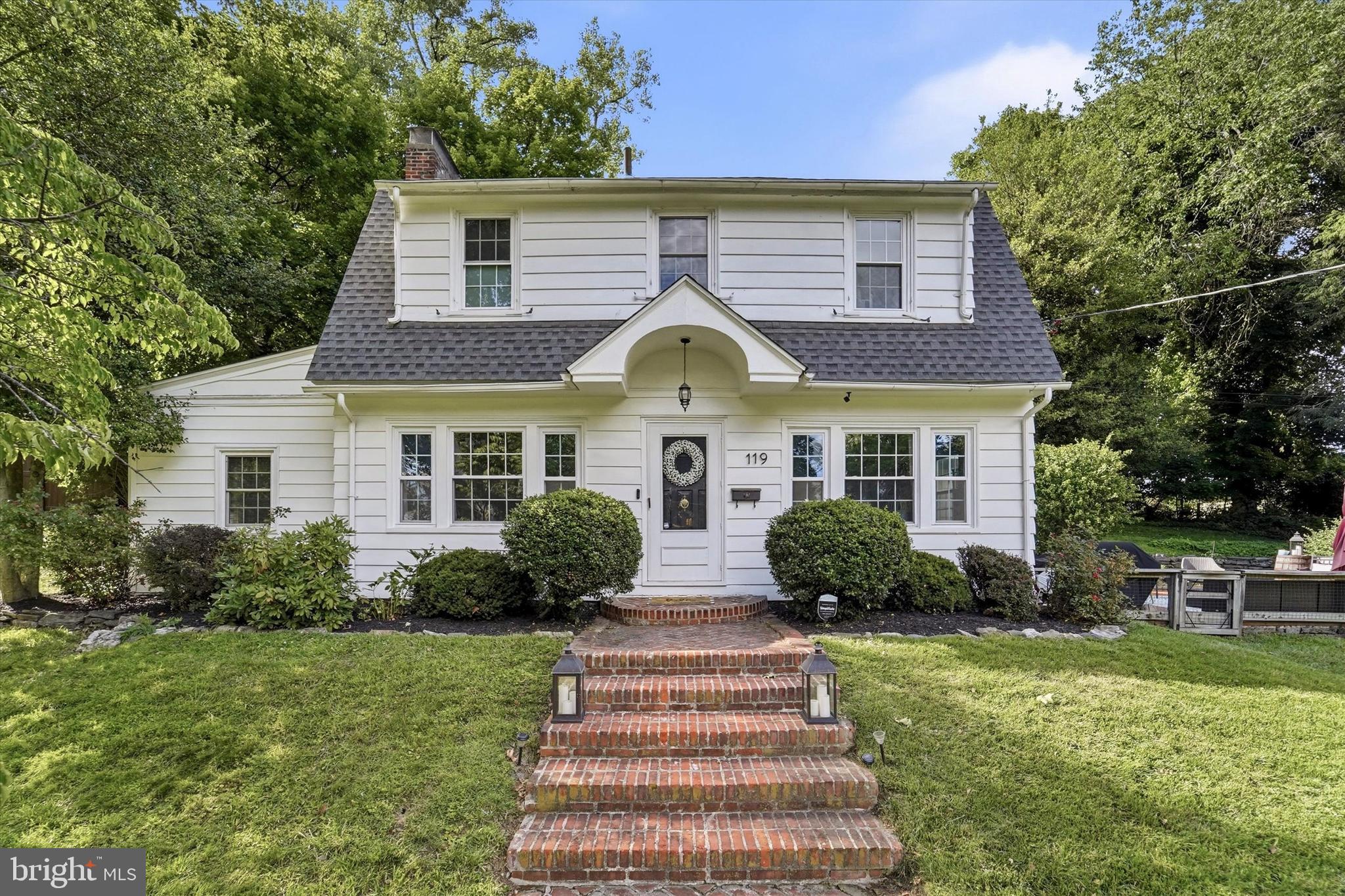 Welcome to 119 Heacock Lane, a beautifully updated home offering the perfect blend of space, comfort, and modern improvements. Situated on the largest lot and widest frontage on the block, this impressive property features 5 bedrooms, 2.5 bathrooms, and approximately 2,380 square feet of living space, including a finished lower level.

Step inside to discover an extra-large living room highlighted by a cozy wood-burning fireplace and beautifully refinished oak hardwood floors that extend throughout the first and second levels. The thoughtfully designed kitchen boasts custom soft-close cabinetry, granite countertops, a custom porcelain backsplash, pot filler above the stove, newer stainless steel appliances, and updated luxury vinyl plank flooring that continues into the mudroom, complete with a custom built-in bench and pantry.

The spacious layout includes three bedrooms on the second floor, a first-floor bedroom, and a newly updated basement bedroom that offers endless flexibility as a guest suite, home office, gym, or playroom. The expansive primary bedroom provides a comfortable retreat, while all 2.5 bathrooms have been tastefully updated, including a completely renovated powder room and refreshed hall and primary baths.

Extensive improvements provide peace of mind for years to come, including a brand-new GAF roof (2026), 30+ professionally installed low-E double-pane windows, a 3-year-old Carrier A/C system, 6-year-old Lennox gas furnace, 200-amp electrical service, newer PEX/PVC plumbing, updated LED lighting, professionally painted interiors featuring Sherwin-Williams designer colors, and a newly updated laundry room.

Outside, enjoy beautifully landscaped grounds, an extra-large brick patio ideal for entertaining, an extra-wide brick walkway, and a driveway with parking for 10+ vehicles. Additional storage is abundant with a large attic and partial basement storage area.

With its extensive updates, versatile floor plan, and exceptional outdoor space, 119 Heacock Lane offers a rare opportunity to own a move-in-ready home with room to grow. Schedule your private showing today!