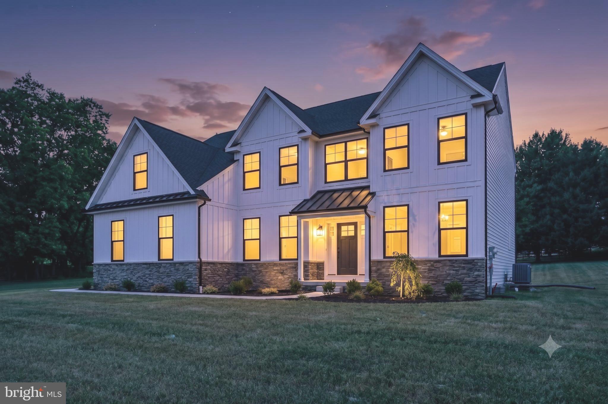 Imagine pulling into the expansive driveway of your brand-new, custom-built sanctuary, situated on a one-acre lot. Located in the highly acclaimed  Spring-Ford School District, this spectacular property offers unparalleled freedom and privacy with absolutely zero HOA restrictions. Step through the elegant front door into an airy, welcoming open foyer. You are immediately greeted by a grand, sweeping turned staircase featuring stunning custom wood treads and striking black accent balusters that set the tone for the entire home. Just off the sunlit entryway, a private first-floor office enclosed by elegant paneled double doors with dedicated space to focus, work from home. Brilliantly designed with a traditional yet modern open-concept layout, the main floor boasts towering nine-foot ceilings & gorgeous wide-plank engineered oak hardwood flooring that flows seamlessly from room to room, extending all the way upstairs to the hallway.  At the heart of the home is the chef-inspired gourmet kitchen. It features towering 48-inch custom maple wall cabinets, gleaming quartz countertops, a timeless subway tile backsplash, and a massive center island seating four under elegant high-hat and pendant lighting. You will absolutely love prepping meals using the top-tier stainless steel appliances, which cleverly includes a dedicated beverage refrigerator built right into the island. Prefer the precision of gas cooking? Just say the word, because that can easily be arranged! Entertaining is completely effortless as the kitchen flows flawlessly into a bright, sun-drenched breakfast room with sliding glass doors leading out to the yard. The oversized shelving pantry is great for ultimate organization.  For larger gatherings, host your formal holiday meals in the magnificent dining room adorned with its own sparkling chandelier and a stunning custom tray ceiling. Afterward, relax and unwind in the massive, inviting family living space, beautifully anchored by a breathtaking floor-to-ceiling stone fireplace. Upgraded three-panel interior doors with premium matte black lever hardware are featured throughout the home.
Heading upstairs, the phenomenal primary suite serves as your own private, everyday escape. This incredible retreat features sweeping cathedral ceilings and a massive custom walk-in closet ready for your entire wardrobe. Its truly luxurious private bath boasts an oversized custom maple double vanity, a deep freestanding solid surface soaking tub, and a breathtaking natural Carrara marble shower! Three additional generously sized bedrooms feature plush, cozy neutral carpeting. One of these bedrooms enjoys the luxury of a private en-suite third full bath, while the others share a thoughtfully designed split hall bath featuring a separate "water closet" and a full-size tub with tiled walls. The private baths feature walk-in showers with elegant ceramic tile walls. Built with meticulous attention to detail and for lasting peace of mind, this spectacular home features premium 2x6 exterior wall construction, high-end architectural roof shingles, and a striking facade blending gorgeous stone paired with vertical and horizontal vinyl siding.  Downstairs, the massive basement offers soaring nine-foot high clearance and is ready for your ultimate vision. Want the basement fully finished as a home theater or game room? It can be done! 
The oversized garage is fully quipped with durable steel raised-panel doors, automatic openers and a convenient separate walk-in doorway. Outside, enjoy a beautiful radius front walkway and the brand-new 12'x14' composite deck to be built in the tranquility of your private backyard. Prefer a larger deck for epic summer barbecues? The builder is happy to discuss upgrading that, too! All of this peaceful country privacy is located just minutes from major highways. incredible local shopping, and the vibrant dining and nightlife entertainment of nearby Phoenixville. Stop dreaming and start living!