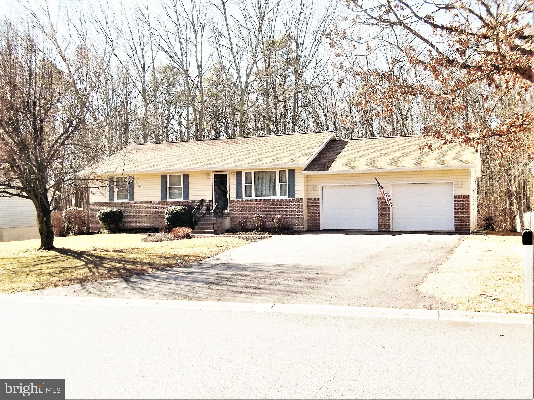 MULTIPLE OFFERS, SELLER WILL MAKE DECISION ON SATURDAY AFTER 6PM  Move in Ready Home - meticulously maintained! One level living! Drive into your 2 car garage and step into your home!  Kitchen/DR Combo, Formal LR, 3 Bedrooms, 2 Full Baths, and Laundry on first level. If extra space is needed, the lower level provides close to 1200 sq.ft.  It can be finished or just used for storage, it includes a door to the back yard. Lot is a half acre with the back yard partially wooded, nice for privacy. Large detached shed is included. Deck with stairs down to yard, comes with a remote controlled awning.  This is a great starter home or for anyone that wants (or needs) 1 level living. Neighborhood is close to the town of Northeast or 9 miles to Havre de Grace, so shopping, restaurant dining, or access to water for boaters is very convenient.  Call to see today!