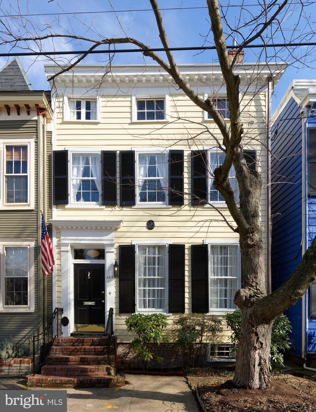 Totally renovated historic home, preserving integrity of 1820 w/all modern luxuries.  3/4 BR 2.5 baths w/ large second family room probable 4th BR. Original floors, tall windows, double parlor living room featuring beautiful crown moldings, fireplaces with classic mantels, designer lighting throughout. Dazzling chef's kitchen highlights the Bertazzoni appliances, sunny breakfast room, deep garden.
