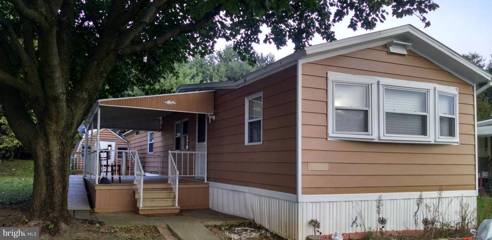 Single wide mobile home with A/C units and generous deck. Storage shed, two off street parking and low lot rent of $285/month.