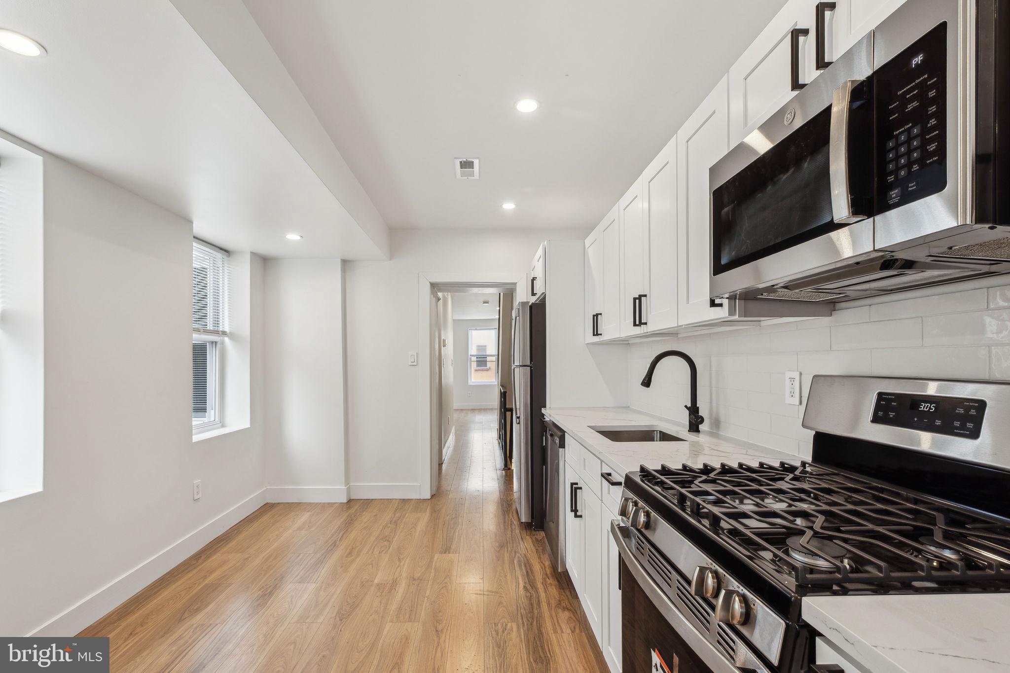 This fully renovated 4-bedroom, 2-bathroom bi-level apartment in Norris Square is brand new from top to bottom. The home features central heat and air, a chef’s kitchen with modern appliances, and two stylish, tiled bathrooms. Tons of natural light throughout the large living room, dining room and each spacious bedroom. Enjoy the convenience of a vibrant neighborhood with cafes, restaurants, and shops a short distance away in Fishtown & Northern Liberties.  Easy access to public transportation and major roads makes commuting to Center City, Universities, and the stadium district simple. Tenant responsible for all utilities. First/Last and one month’s security deposit due at lease signing. Credit and background checks required. Pets allowed on a case-by-case basis. *Final rent amounts for PHA applicants will be determined by PHA*