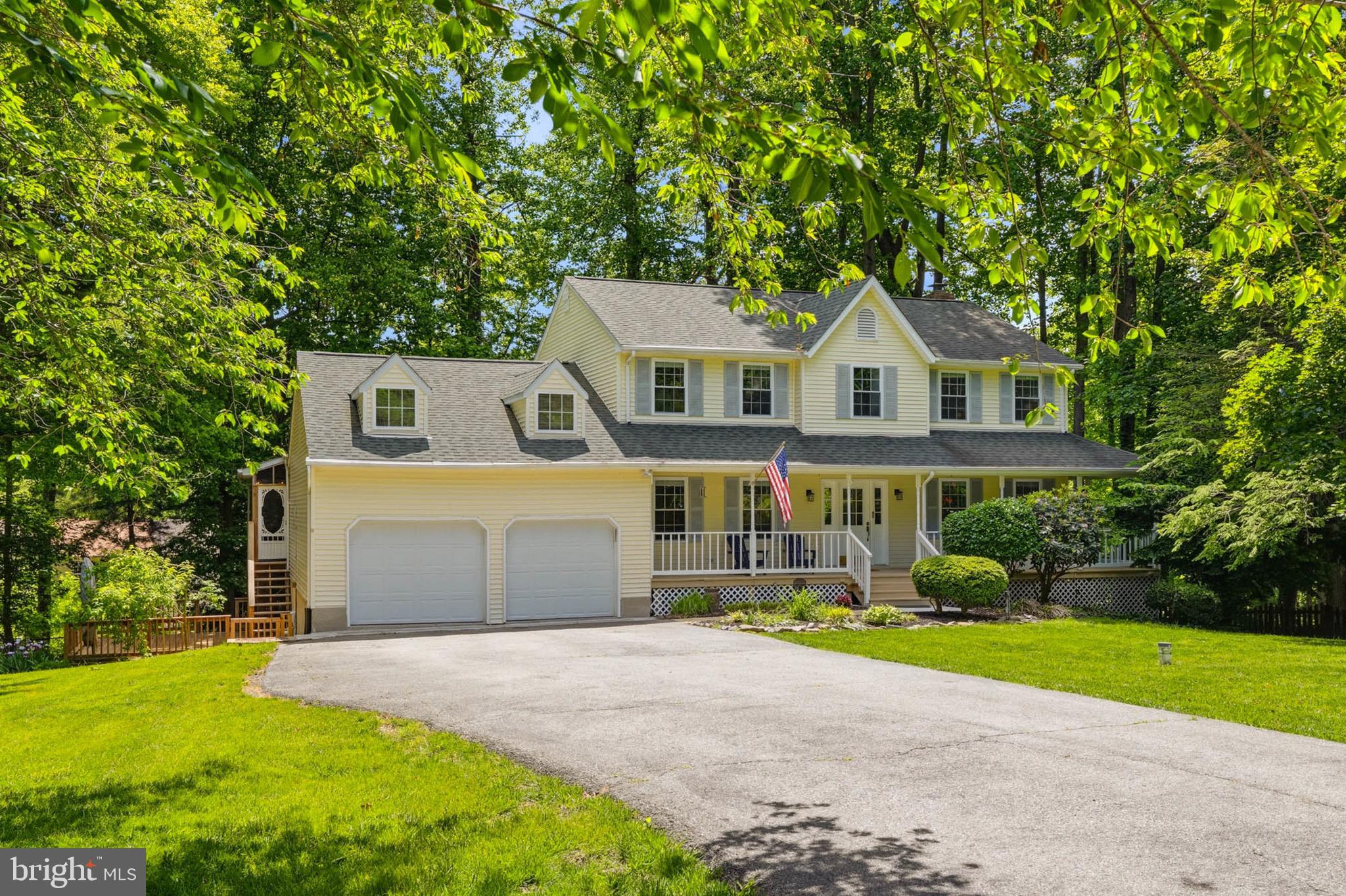 Located in Owings on the North Beach line, this freshly painted two-story home with a walkout basement offers comfort, convenience, and coastal living in a sought-after school district. Situated on a quiet cul-de-sac, the property is just minutes from shopping, restaurants, the public beach and pier on the Chesapeake Bay. The kitchen and bathrooms feature granite countertops, stainless steel appliances, LVP flooring, and recessed lighting. French doors lead to a spacious screened porch overlooking the large backyard with mature hardwoods and a new rear fence, all set on nearly one acre. The home also features a spacious owner’s suite with walk-in closet and private bath, generously sized secondary bedrooms, a finished walkout basement, and a welcoming wrap-around porch perfect for relaxing and enjoying the peaceful setting.