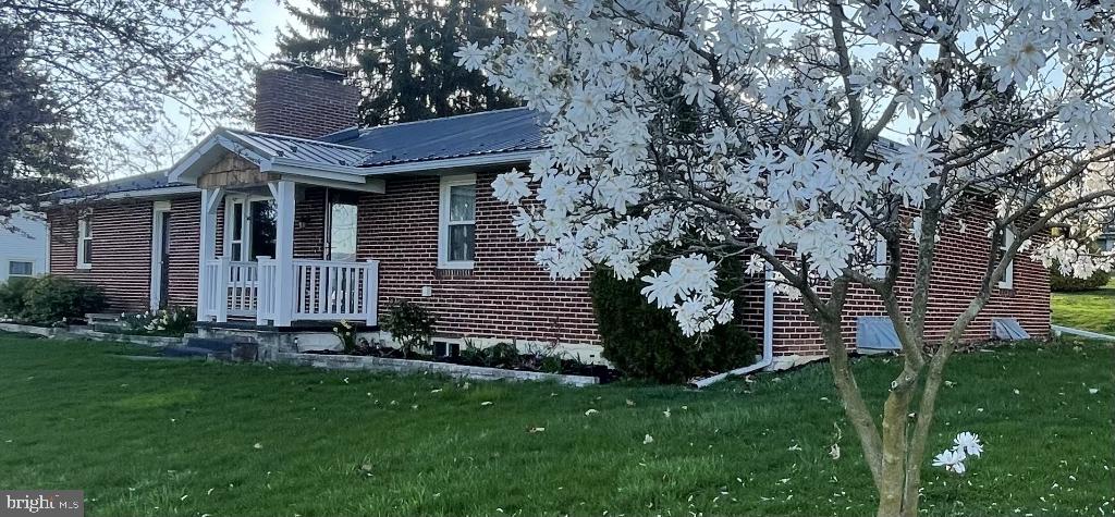 Completely remodeled charming brick ranch home with open concept kitchen/living room. Quartz countertop & custom hickory breakfast bar in large kitchen. Two fireplaces PLUS wood stove capable of heating entire home (electric baseboard otherwise). Enormous rec room that can be used as a 4th bedroom. 1st floor laundry w/easy access to backyard & clothesline. New metal roof in 2023. Oversized attached 2-car garage w/work bench. Paved turn-around and additional parking area behind garage. 12 x 20 shed. 1/3 acre in quiet neighborhood area w/friendly neighbors & easy access to main roads. Close to major highways, such as 144, 45, 322, and I-80.
