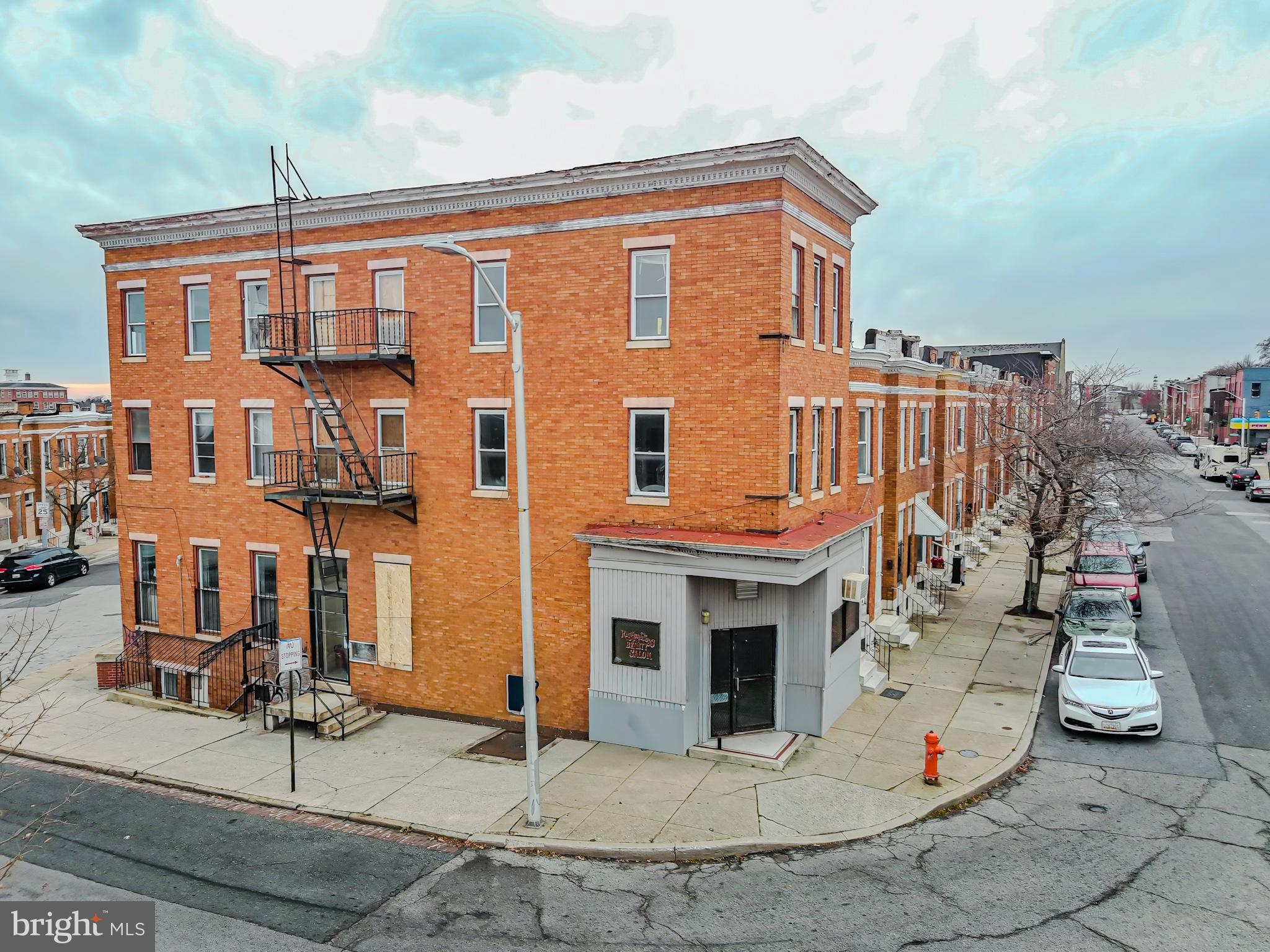 Prime Mixed-Use Investment in Baltimore — Near Penn Station Metro Discover a rare mixed-use investment opportunity in the heart of Baltimore’s redevelopment corridor, just moments from Penn Station Metro and major transit access. This 3,000 square-foot commercial building strategically blends residential and retail income potential, ideal for investors, owner-users, or long-term holders. Property Highlights Four one-bedroom, one-bathroom residential units on the upper two stories — strong rental demand from commuters and urban professionals. Two street-level retail spaces with high visibility and pedestrian exposure — perfect for neighborhood tenants, boutique concepts, or service businesses. Located in a development-intensive section of Baltimore, proximate to transit, dining, entertainment, and employment centers — enhancing long-term value and tenant desirability. Excellent positioning for diversified cash flow and asset appreciation. This offering represents a versatile asset with mixed revenue streams in a high-growth, transit-oriented market. Showings by appointment only — contact the listing agent for details.