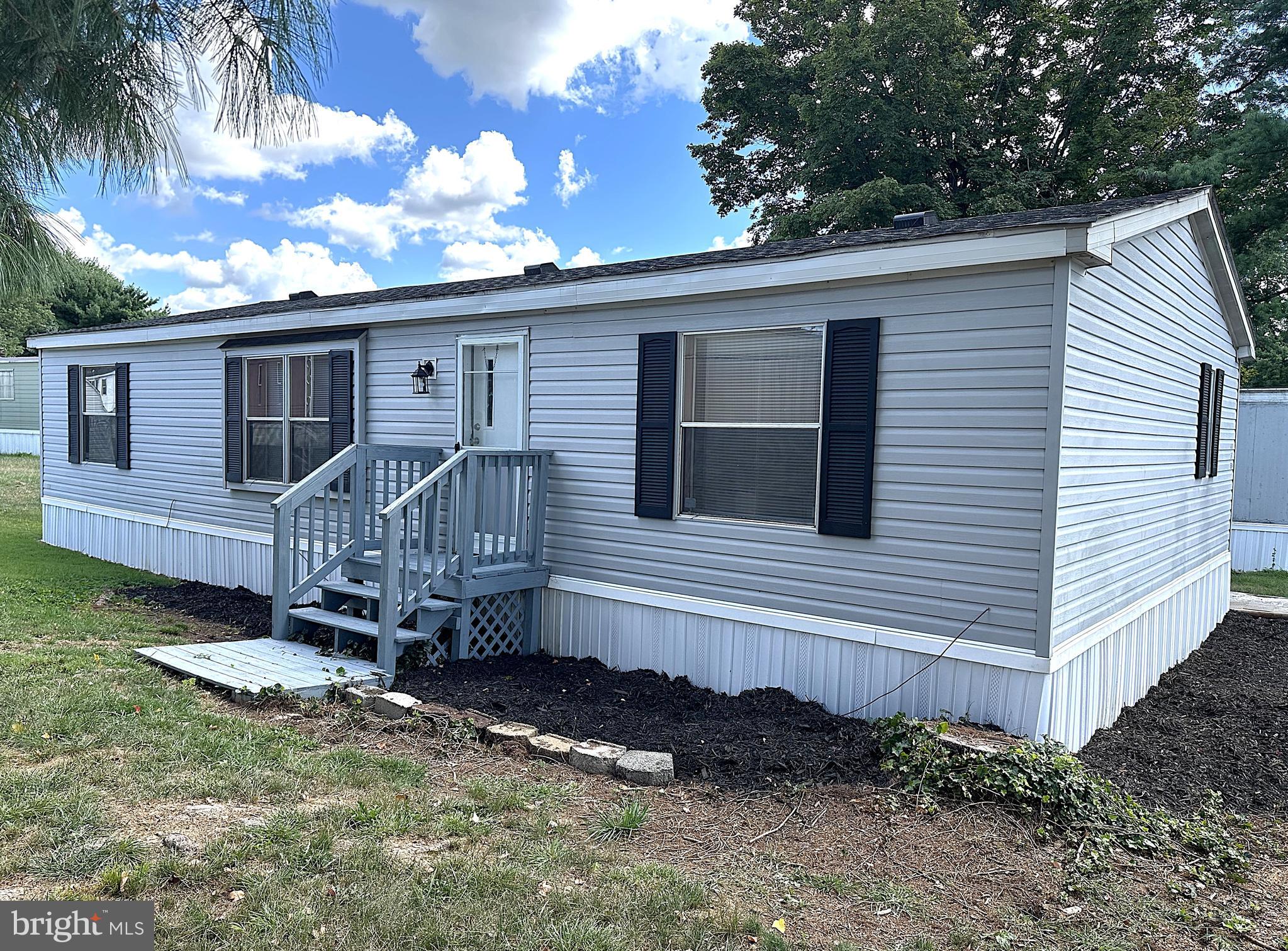 PRICE IMPROVEMENT! Beautifully Renovated Double Wide in Sought After Lakeside Village Mobile Home Community! Over 1400 Square Feet of Finished Living Space with Updates Including New Architectural Shingle Roof, New HVAC System, New Waterproof Pergo Flooring Throughout Main Area, Kitchen and Bathrooms, Freshly Painted Kitchen Cabinets with New Hardware, Updated Stainless Steel Appliances in Kitchen, New Skylight, New Light Fixtures, New Ceiling Fan and New Paint Throughout. Inside Features Large Living Room, Separate Formal Dining Room, Big Primary Bedroom with Private Bathroom, New Garden Soaking Tub and Walkin Closet. Outside is Nicely Landscaped with a Front and Back Porch, Paver Walkways and a Paver Patio Perfect for Grilling. Community Perks Include a Swimming Pool, Fitness Center and Community Club Room Available to Rent for Family Functions or Parties. Easy Access to 71 and 70. Close to Shopping, Restaurants and Downtown. Don't Delay, this one won't Last!