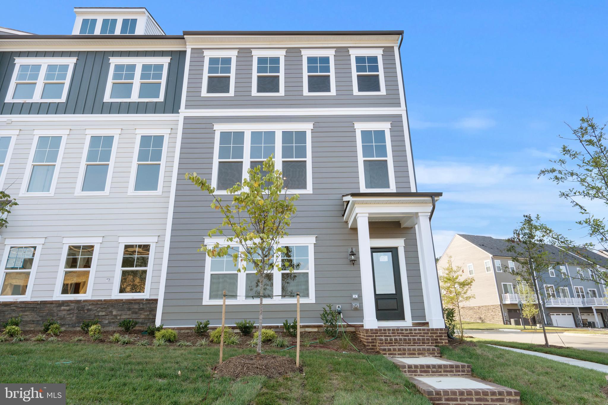 Do not miss this gorgeous end unit town home!
Amazing opportunity to buy this Stanley Martin luxury Townhome in Northern Virginia’s most sought-after community Potomac Shores. This light filled four bedroom 3 full and one-half bath end unit is the largest townhome in the community and has just finished construction. Potomac Shores is on the Potomac River and the community has two brand new schools (and Elementary, and a Middle) and boasts more amenities than any other new community in Northern Virginia. Enjoy a workout in the new huge fitness facility, or take advantage of the Social Club, Canoe Club, Olympic Pool, Splash Park, Secondary Pool, Golf Club, Restaurants, and the new VRE stop and Town Center that are quickly to follow.
Conveniently located to 95, Quantico, Ft. Belvoir, and Washington DC!