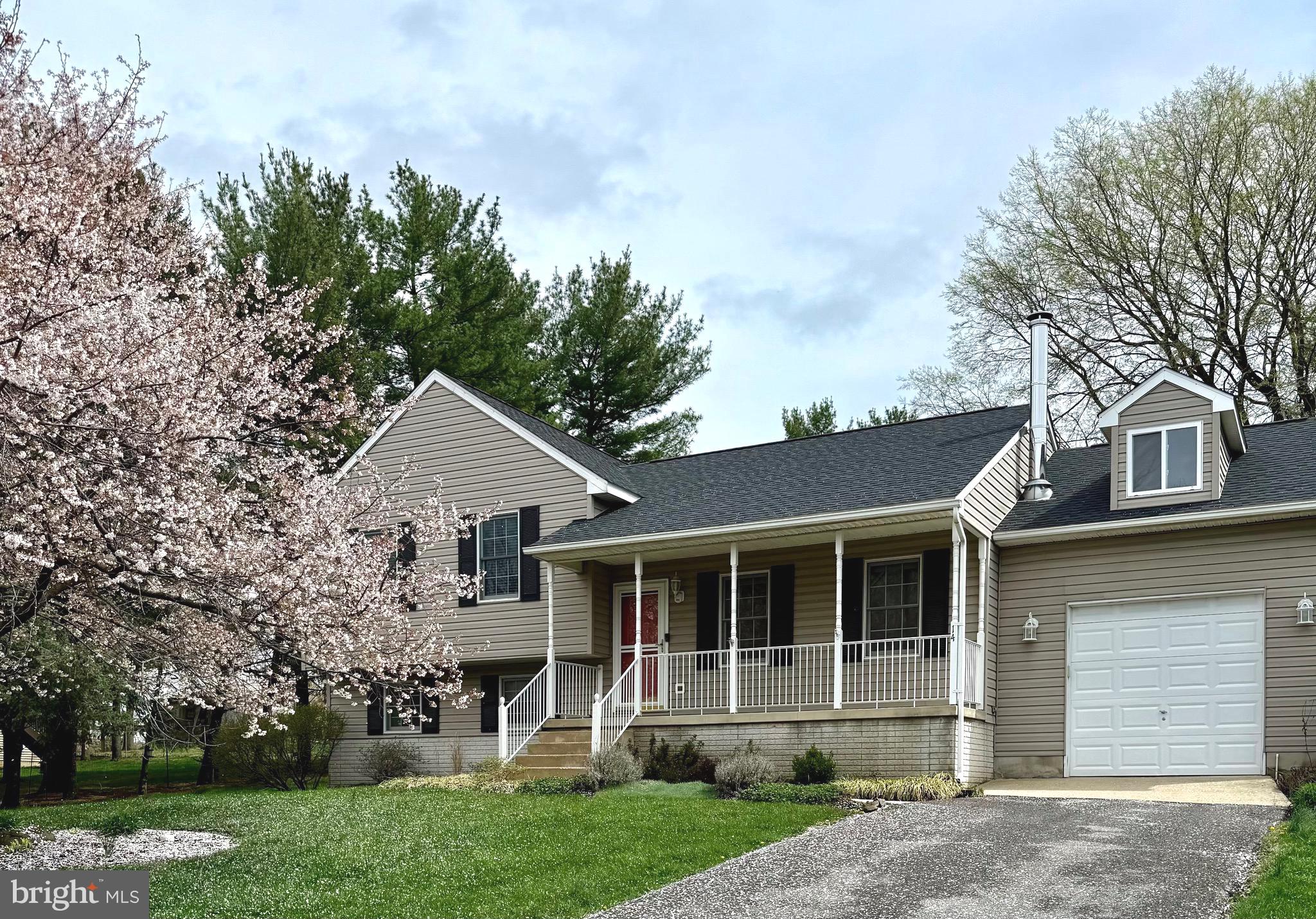 Looking for small-town charm just minutes from city conveniences? Look no further! This stunning four-level split home on the edge of historic Woodsboro is the perfect match!  This property offers peace of mind with major updates already taken care of and NO HOA! Recent updates include a newer roof, water heater, HVAC system, and more.

Nestled on a peaceful half-acre lot (approx.) at the end of a quiet, non-through street, this updated home provides a serene taste of country living. The spacious backyard offers picturesque views, and you’re just a short walk from Woodsboro Park. Plus, the property is connected to public water and public sewer for added convenience.

Step onto the charming front porch and into the entry foyer, the perfect place to hang your coat. Inside, the main level features a cozy living room with beautiful hardwood floors and an upgraded eat-in kitchen boasting granite countertops and newer appliances.

The upper level offers a relaxing retreat, complete with a primary suite, freshly painted and featuring a private bath. Two additional bedrooms and another full bath complete this level.

The lower level is an entertainer’s dream, featuring a spacious family room with a wood-burning stove and a wet bar- ideal for hosting gatherings or family game nights. A third full bath with a jetted tub adds extra convenience.

But that’s not all! The fourth level offers two versatile rooms, giving you plenty of space to make it your own-whether it’s a home office, gym, or hobby room.

Don’t miss your chance to call 14 James St. home!  Convenience is key here- located just outside Walkersville, the house is minutes away from parks, all the shopping and dining options Frederick has to offer. Plus, the convenience of nearby Route 15 and easy access to I-270 and I-70 means you can enjoy quick commutes to Washington, DC and Baltimore.   Schedule your tour today and experience the perfect blend of small-town charm and modern convenience.
