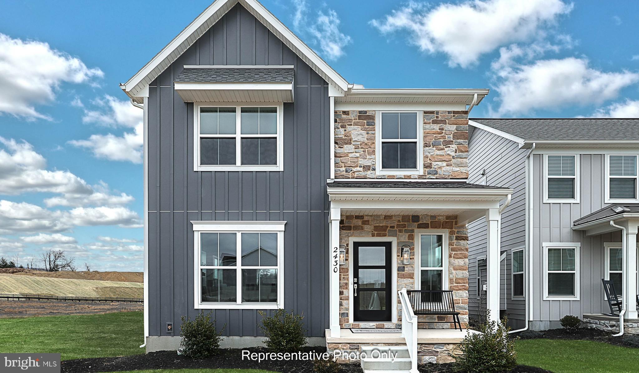 UNDER CONSTRUCTION – AVAILABLE THIS SUMMER: This charming 2-story home includes a 1-car, rear load garage with mudroom entry, and a covered porch for outdoor living. The first floor boasts 9’ ceilings and vinyl plank flooring throughout the main living areas. The kitchen, featuring stainless steel appliances, attractive cabinetry, and quartz countertops with a tile backsplash, opens to the spacious dining area and sunny living room warmed by a gas fireplace with floor to ceiling stone. The 2nd floor boasts an owner’s suite with an expansive closet and private bathroom, 2 additional bedrooms, a second full bathroom, and a convenient laundry room.