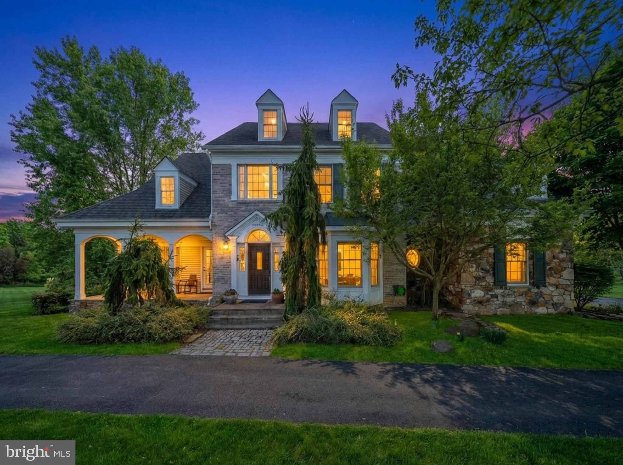 Nestled in the heart of western Loudoun County, this exceptional Purcellville horse farm offers a TOTAL OF 25 SCENIC ACRES ACROSS TWO SEPARATE PARCELS, combining privacy, functionality, and breathtaking natural beauty. Surrounded by gentle creeks and miles of incredible ride-out, the property is a dream setting for equestrians and nature lovers alike.

The charming residence is perfectly positioned to capture sweeping mountain views, with a welcoming wrap-around porch extending from the main-level primary suite with two cedar walk-in closets. Thoughtfully designed outdoor spaces include beautifully landscaped grounds and peaceful patios that invite relaxation and effortless entertaining.

Equestrian amenities include a well-appointed 4-stall center aisle barn, board fencing, an automatic waterer and a lovely log course for jumping right on the property. The acreage offers ample room for paddocks, grazing, and expansion, all while being immersed in a serene, picturesque setting.

Whether you’re seeking a private retreat, a functional horse property, or a blend of both, this rare offering delivers the best of Loudoun County living—tranquil, refined, and deeply connected to the land. New in 2025 - primary bathroom, kitchen appliances, insulated garage doors, chimney liners, driveway, washer/dryer. Electric vehicle charger in garage. 

The property is enrolled in the Virginia Open Land Tax Adjustment, lowering the property tax significantly. Seller not responsible for roll-back taxes.