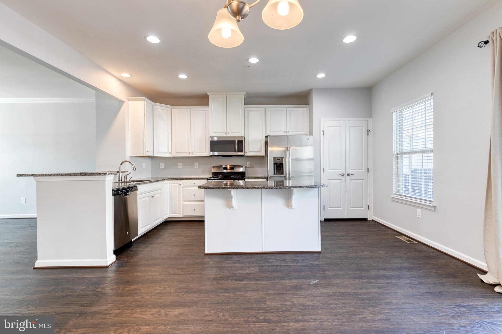 Get comfortable in this beautiful 4 level home with two spacious decks! Located  in a quiet neighborhood featuring easy access to shopping, dining, and entertainment. The main floor features a large open kitchen/dining area, a comfortable family room and there is even space for a desk/home office/homework center!  Enter the home through a street level door or through the two car attached garage. Lower level includes a comfortable den/family room with  one-half bath. The upper-level primary bedroom suite includes a large  walk-in closet and a full bath. Two more spacious bedrooms on the  upper level share a full bath. 4th level features a generously sized loft (optional 4th bedroom) with a full bath that walks out to  a beautiful deck.  Enjoy exclusive access to the community's state of the art amenities including clubhouse, outdoor pool, and fitness center. 

Monthly rent is priced at $3000/month; first month's rent and one month security deposit needed to move in ($6000). Utilities are not included in the price. Verifiable income of at least 3x monthly rent and 650 minimum credit score is necessary to quality. Pets are allowed and will be considered on a case to case basis.