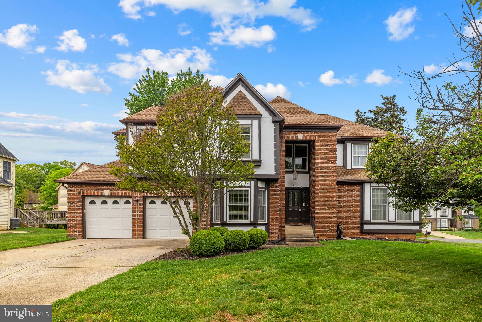 Your dream home awaits! Located in the sought-after Countryside neighborhood, this 4 bedroom, 4.5 bath home has 3 finished levels and 4,395 finished square feet of living space! There are many updates throughout the home, and it has been meticulously maintained. 
Low maintenance corner lot is fenced in the back. 
The grand 2-story foyer has a library with beveled glass double doors on one side, and a formal living room on the other. 
The library has built in bookcases, oak paneling and a bay window. The living room is adjacent to the formal dining room- great for entertaining! A handy butler’s pantry is between the dining room and kitchen. 
The kitchen has a large breakfast area with a bay window, lots of windows for natural light, granite countertops, stainless steel appliances, double wall ovens and an induction cooktop, plus a huge walk in pantry. There is an abundant amount of oak cabinetry, some with leaded glass doors, and updated pendant lights over the island. 
A spacious family room is off the kitchen with a custom fireplace mantle with marble surround plus built-in shelving. A sliding glass door opens to a deck that runs across the entire width of the home. 
The upper level has 4 bedrooms and 3 remodeled full baths. The primary bedroom has a sitting area, a cathedral ceiling, a beautiful updated en-suite bathroom with a separate soaking tub and large walk-in shower with double shower heads.  To top it all off, there’s a fabulous walk-in closet with built in shelving and storage. 
Bedroom #2 has its own updated bath and bedrooms #3 and 4 share a “Jack and Jill” bath. 
Another great feature is the washer and dryer are on the bedroom level in this home. The new washer and dryer convey to the purchasers. 
The basement level has a workshop, plenty of storage space, full bath #4 and a large recreation room. 
The roof was replaced in 2022, the hot water heater replaced in 2025. The HVAC system has also been replaced. 
There is a propane tank for the gas fireplace and it also operates the gas grill on the deck. 
Off the family room is a mudroom with amazing built- in storage that leads to the 2-car garage. The garage has auto openers. 
Countryside, known for its tree covered lots, offers Potomac River access, common grounds, walking trails, pools, tennis courts, and tot lots. Top-rated schools, restaurants and shopping are nearby, as well as Algonkian Regional Park and Dulles airport. 
This home has been lovingly cared for.  There’s nothing to do but move in!