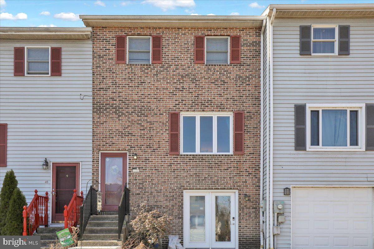 This is a great starter townhome.   Cute kitchen that leads to dining room and sliding door out to the deck.  Family/living room with lots of natural light.  Half bath on the 1st floor.   Upstairs features 2 nice sized bedrooms and a full bath.   Great family room in the walk-out lower level provides extra living space.  Lower level also features a built-in storage area.  Community amenities feature an outdoor pool, basketball and tennis courts and a playground for the kids.  Terrific amenities for an affordable price!
