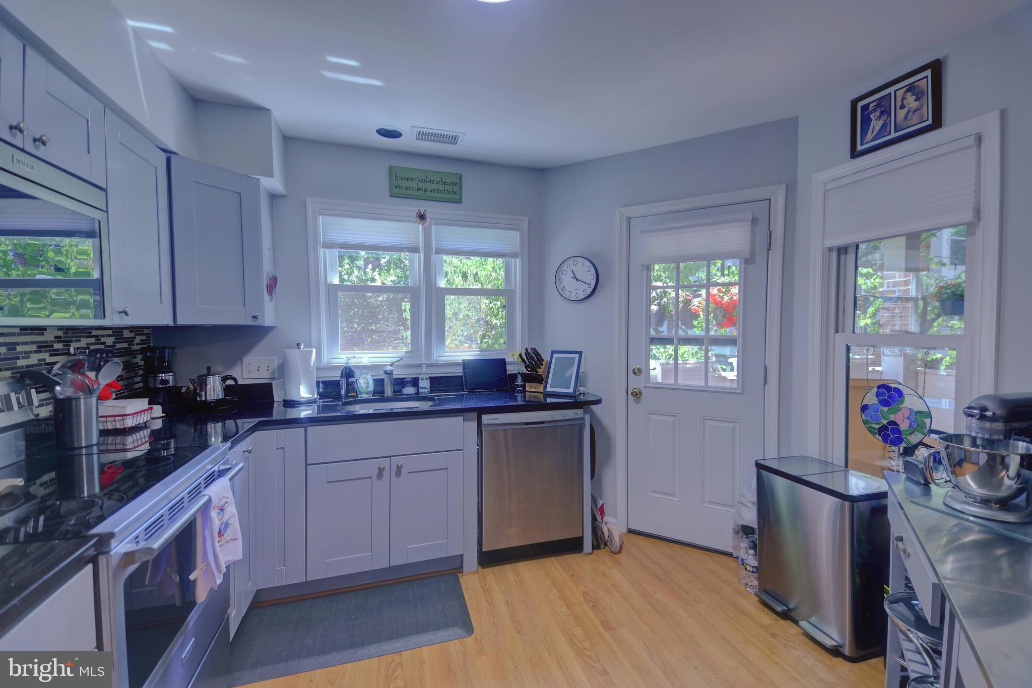 This bright, inviting 2BR/2BA is one of the community's coveted two-bedroom units, set in a waterfront community in one of Northern Virginia's most desirable inner-suburb locations. Enjoy scenic paths just outside your door and quick access to I-495, the Orange Line, Mosaic District, Inova, Giant, Providence Rec Center, and Falls Church High School. Large windows fill the home with natural light, while the expansive balcony — accessible from both the living room and kitchen — extends your living space for summer evenings or quiet winters by the wood-burning fireplace. Community amenities include one resident parking permit, three guest passes, seasonal pool access, and a clubroom for events. Recent updates: Brand-new high-efficiency HVAC system (installed 6/2026, still under warranty) Recently replaced water heater, range, refrigerator, and plumbing fixtures.