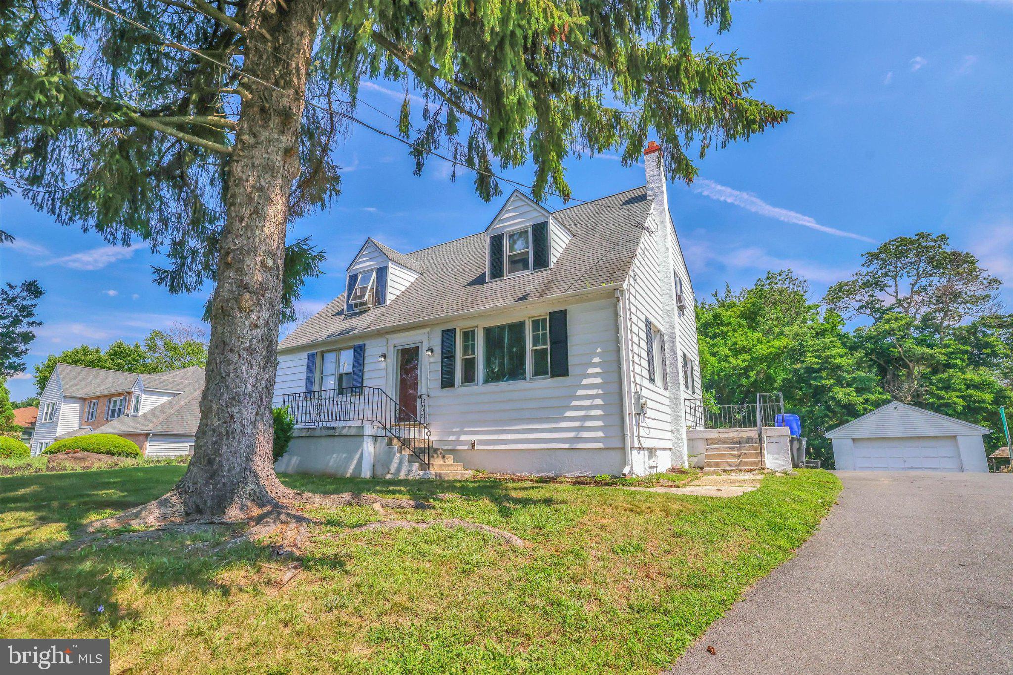 Rare opportunity to own 4101 Naamans Creek Rd, Upper Chichester, PA 19061—a spacious and versatile expanded Cape Cod offering nearly 2,000 square feet of living space, 5 bedrooms, 2 full bathrooms and a detached 2-car garage. Designed with flexibility in mind, this home provides the perfect blend of comfort, functionality, and convenience for today’s changing lifestyles. Move-in ready and full of potential, this home is ideal for growing families, multigenerational living, or anyone seeking extra space.
Step inside to find beautiful hardwood floors and a welcoming layout featuring two bedrooms and a full bathroom on the main level—ideal for guests, a home office, or the in-laws. The extended eat-in kitchen offers an abundance of cabinetry, generous counter space, and room for everyday meals and gathering with family and friends. Upstairs, discover three additional bedrooms, a comfortable sitting area, and a recently renovated full bathroom. The home continues to impress with a full unfinished basement offering excellent storage and endless possibilities—create a home gym, recreation area, workshop, or additional living space ready for your vision. Outside, enjoy a large backyard perfect for entertaining, gardening, or relaxing. The long driveway supports up to 5 additional cars and leads to an oversized detached 2-car garage, providing exceptional storage, parking, and space for hobbies, projects, or equipment.  The detached garage could also serve as a workshop, storage for car enthusiasts, or a thriving home business. Sit back and relax knowing these recent upgrades have already been done... including a smart high-resolution touch screen refrigerator, recessed lighting in the living area, washer and dryer in excellent condition, and an EV charger for your electric vehicles. With its rare combination of five bedrooms, first-floor living options, hardwood floors, flexible spaces, and a convenient location near shopping, dining, major highways, and tax-free, this home offers tremendous value and room to grow.
Schedule your private showing today and experience the possibilities.
