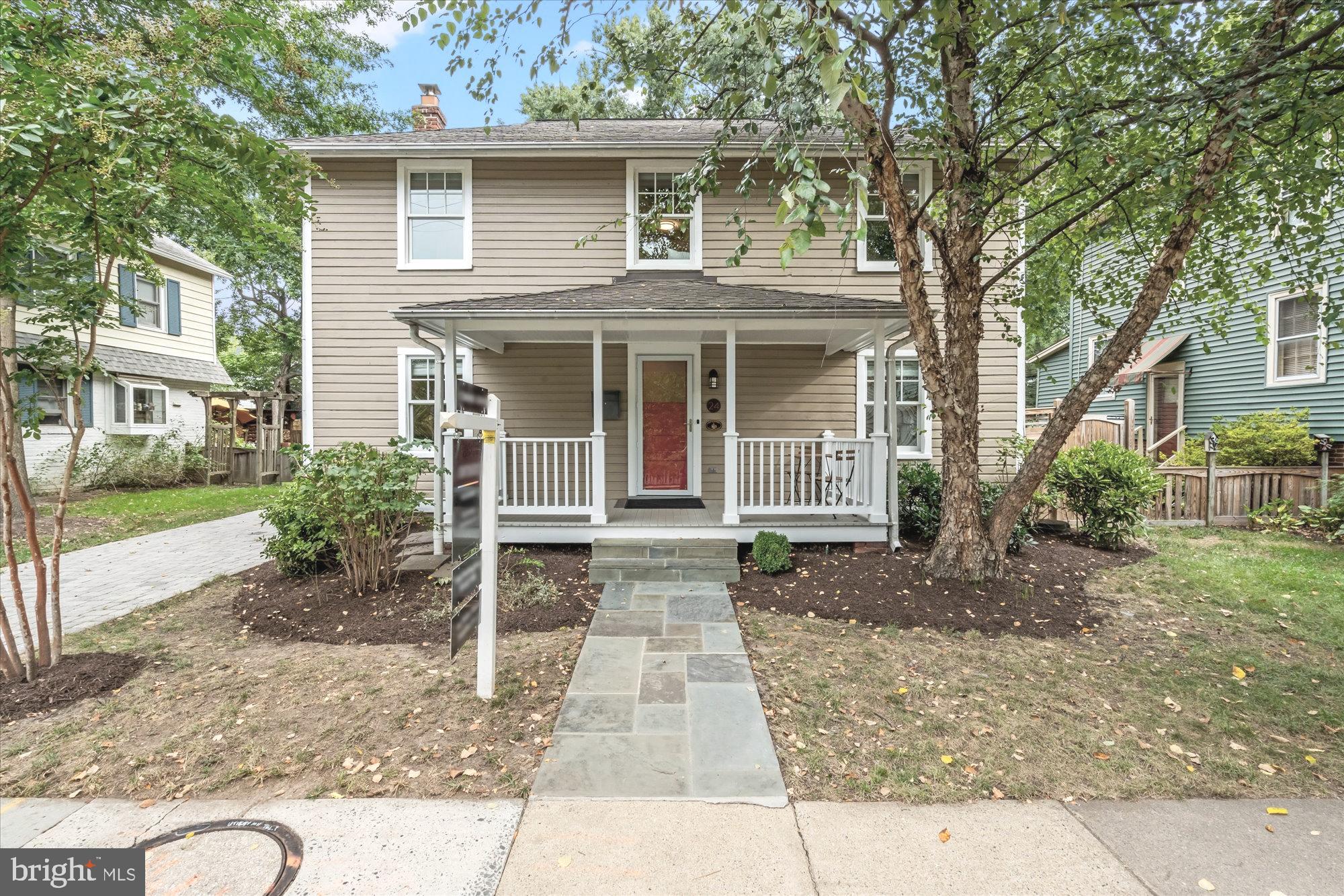 Welcome to 24 E Bellefonte Avenue – a timeless farmhouse in the heart of Del Ray blending elegance with modern comfort. Built in 1920, this four-bedroom, 2½‑bath home (2,416 sq ft) offers classic architectural details and thoughtful updates, all just a half‑block from “The Avenue.” Step inside to a stunning living room anchored by a wood‑burning fireplace and a wall of custom built-ins, a spacious formal dining room, and a kitchen that’s been beautifully refreshed with granite counters, stainless appliances, a large center island and warm wood cabinetry. The main level also features a convenient bedroom (would be a great office) with a half bath (convert to a full bath if needed!)ideal for guests or working from home. A family room doubles as an extra bedroom and is perfect for a playroom or den. Upstairs, you’ll find the primary suite with a fully renovated en-suite, huge walk‑in closet and in‑suite laundry. Two additional well‑sized bedrooms and another full bath round out this level. The lower level basement has been completely waterproofed and is waiting for your special touch! Outside, the front porch is the perfect place to sip morning coffee and watch the world go by. The private back patio overlooks a fully-fenced yard, perfect for relaxing, entertaining or for children and pets to roam. This location can’t be beat! Leave your cars in the driveway and walk to Del Ray’s shops, cafes, the farmers market, dog parks, and wellness studios. Minutes to Old Town Alexandria, the Metro, Amazon’s HQ2, the VA Tech campus, the Pentagon, and I‑395. Come experience the charm, craftsmanship, and convenience of 24 E Bellefonte—this is Del Ray living at its finest. Welcome Home!