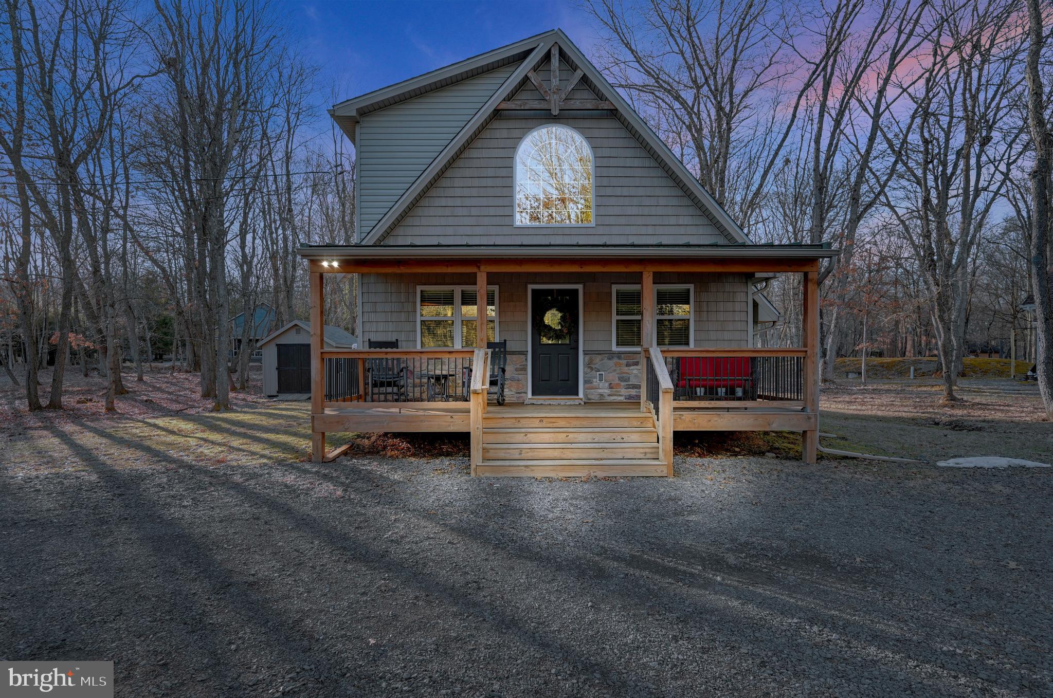*Multiple Offers-Best and Final by 2/12/24 at 5pm* Roses are Red, Violets are Blue, 215 Keats is meant for you! A match made in heaven is this show stopping chalet home located in beautiful Towamensing Trails.  Just 4 years young, you won’t need to lift a finger because the interior and exterior finishes are stunning plus all of the furniture is included!  Nestled on a corner lot that’s over a half acre, sit awhile and relax on the front porch or hang out on the back deck with nearby fire pit.  The home is truly maintenance free with vinyl plank flooring and granite countertops, a stunning plank accent wall along with open loft for extra living or sleeping space. In addition the house being just downright adorable, you can have privacy with the primary bedroom plus full bath downstairs and the remaining 2 bedrooms and bath upstairs.  Cozy up around the fireplace inside because the living & dining space is truly open concept.  The community offers a lake for fishing and boating, sandy beach, outdoor pool, and tennis. Less than 2 hours from Philly or NY you are just minutes away from skiing at Big Boulder or Jack Frost plus plenty of other Pocono attractions like Historic Jim Thorpe, Whitewater Rafting, State Parks, Biking, Hiking, Wineries and Distilleries.  The recreation possibilities are endless and the centerpiece will be your new home at 215 Keats Lane!