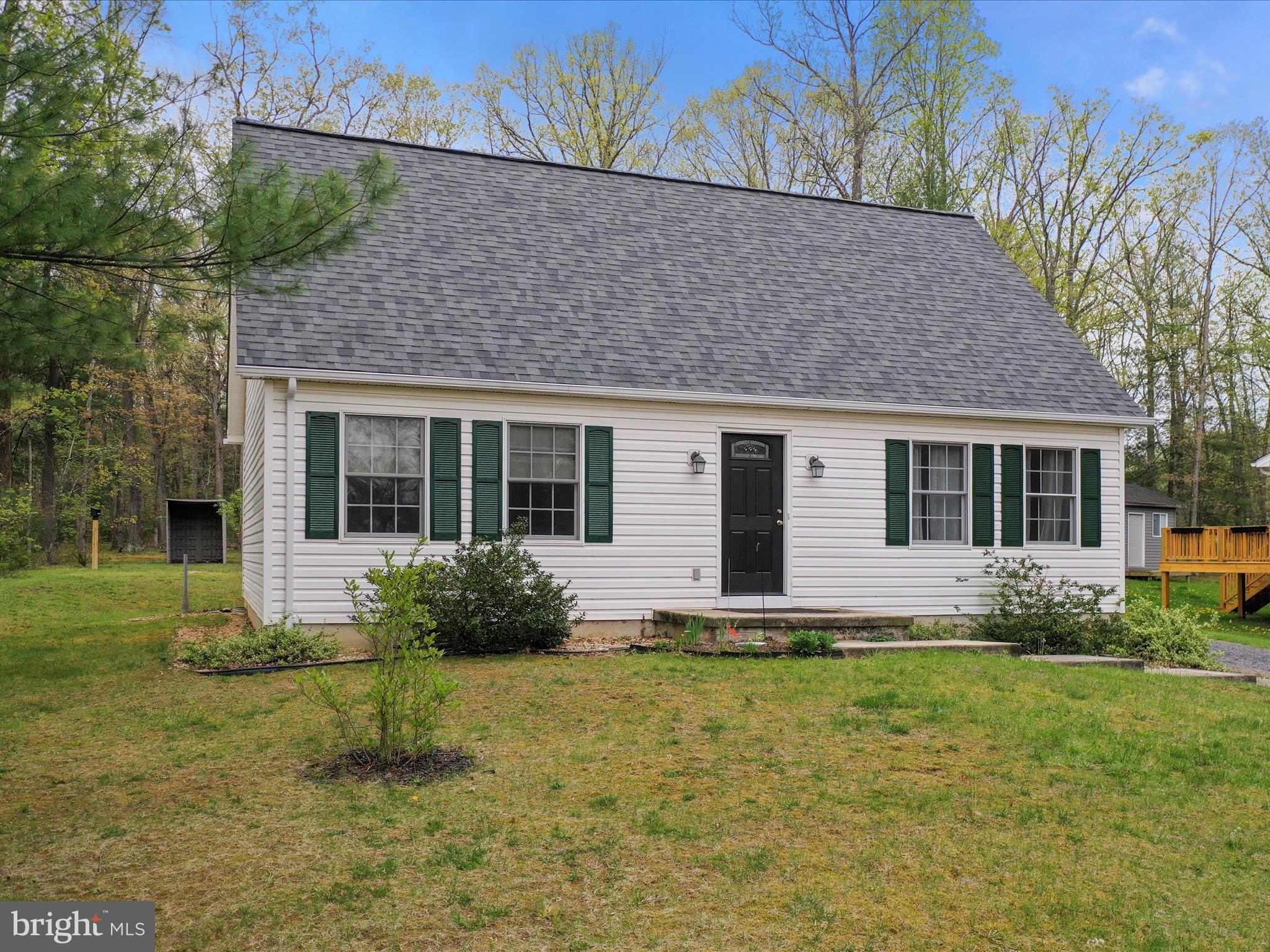 Welcome to 634 Warden Circle, Wardensville, WV!
This move-in ready 4BR/2BA Cape-Cod  home is located in the desirable Warden Acres subdivision. The main level features two bedrooms, a full bath, and a convenient laundry area—perfect for easy one-level living. Upstairs offers two additional loft-style bedrooms and a second full bathroom, ideal for guests or extra space.

The bright and open interior is filled with natural light and boasts numerous recent upgrades, including new flooring, roof, water heater, countertops, appliances, updated bathrooms, and fresh paint throughout.

Enjoy the outdoors with mature landscaping, blooming flowers, and fruit-bearing apple and peach trees. A fully functional 7x8 greenhouse makes year-round gardening a breeze. The backyard borders the community playground and pavilion, offering extra space for recreation and entertaining.

This home features public utilities and high-speed fiber optic internet, making it as connected as it is comfortable. All located in a quiet neighborhood just 5 minutes from grocery stores, restaurants, and local cafes.

Clean, updated, and ready for immediate move-in. Schedule your showing today! Check out the 3D tour!