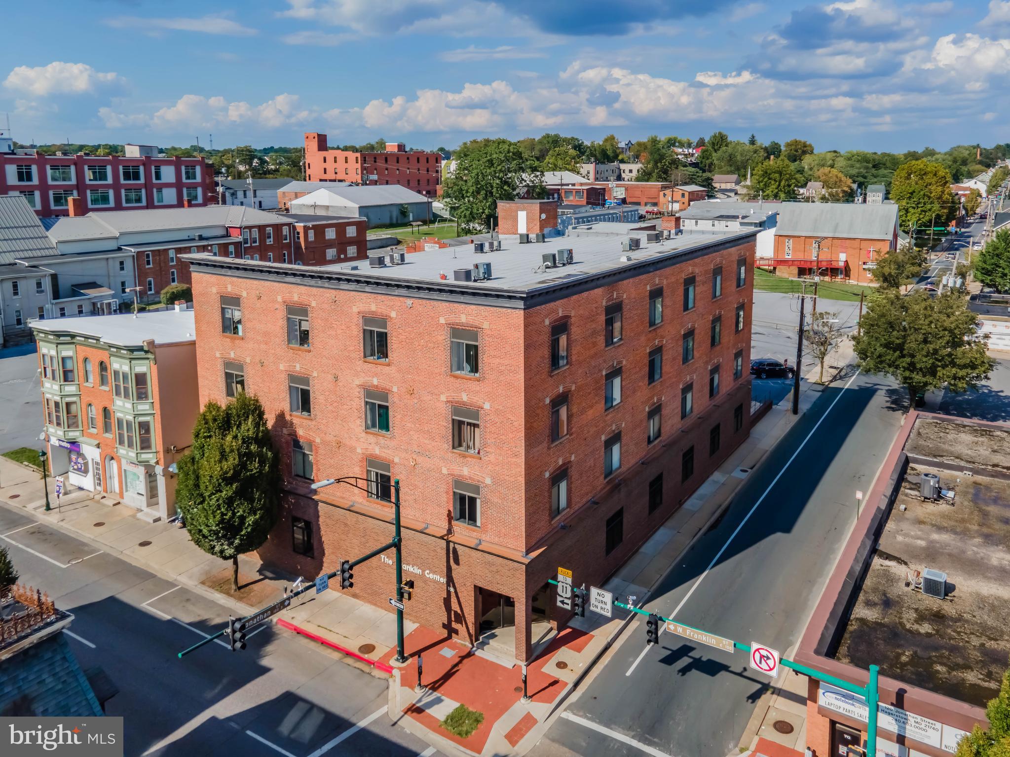 Partial or 100% owner financing dependent on some conditions and up to $250k for potential remodeling of 2nd floor and 1st floor apt.  Building is now priced at $100 / SQFT.  The site is improved with 33,816 square feet 4 story brick building.  Currently being used as mixed use: As the Parole and Probation Division of Washington County. 16 Residential 1-bedroom units fully rented.  2nd floor commercial, currently vacant which was the original location of the Probation Division.  2nd floor has potential for an additional 8 residential apartments or keep it commercial.  Also, has an option to add an additional 2 bed apartment on the first floor. Take a look at the pictures to assess readiness. If you want Cashflow, this is your ideal property.  This property is offering a prime location which is strategically located in the Heart of Hagerstown with high traffic area and its close proximity to major highways and transportation hubs, including I-81, I-70 and Hagerstown Regional Airport.  The surrounding area offers a dynamic and vibrant community with a great mix of business, restaurants and shops within walking distance.  The property's prime location gives you access to one of the fastest growing areas in the Tri-state region (The I-81 corridor), and major investments. (Medical college 2024, Hitachi's new 350 million investment, a new baseball stadium, Amazon Hub and many more other investments.  The 2nd floor could be remodeled back to residential or keep it commercial.  The options are endless, and best of all, plenty of parking.  Additional multiple parking lots available with the sale. Set up your showing today!!