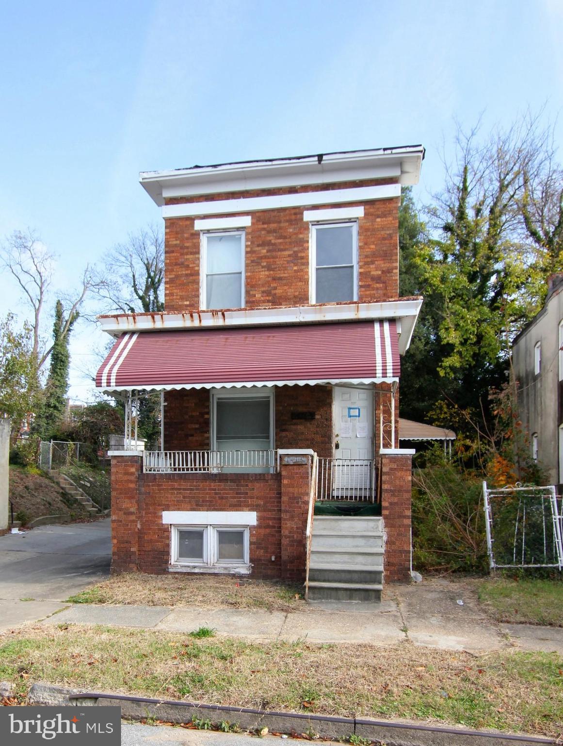 This porch-front, detached home on a block full of townhomes is priced to sell! Spacious open rooms on main level, three bedrooms and a full bath upper level and covered porch out back. Low property taxes, no HOA and an entry point price leaves room for an investor or owner occupant to realize a lot of sweat equity after renovation. Cash or Renovation/Rehab loan.