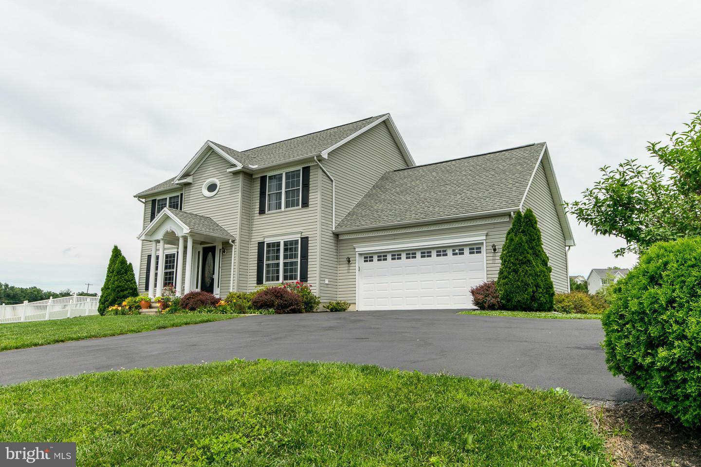 Gorgeous home with recent upgrades to kitchen and baths, new hardwood floors and finished basement. Fantastic owners suite with luxurious bath, huge closet. All baths have ceramic tile, home has newer carpet tons of upgrades. Home sits on almost an acre of land with scenic views, beautiful landscaping and deck for entertaining. Sought after Federal Hill S/D.