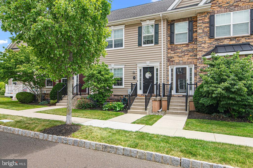 Welcome to 3910 Cephas Child Road #2, a beautifully maintained and updated townhome in the desirable Carriage Hill community and award-winning Central Bucks School District.

Step inside to an open-concept main level featuring 9-foot ceilings, a spacious living room with a fireplace, and a convenient powder room. The kitchen offers an oversized island, stainless steel appliances, and sliding glass doors that fill the space with natural light and lead to the rear patio.

Upstairs, the primary suite features a large walk-in closet and an en-suite bath with a soaking tub. A second spacious bedroom also includes its own full bathroom and walk-in closet. The finished lower level provides additional living space ideal for a family room, home office, gym, or playroom, along with ample storage and a laundry area.

Recent updates include a new HVAC system, new carpeting in the bedrooms and second-floor hallway, new carpet on the basement stairs, new basement flooring, and fresh paint throughout much of the home.

Ideally located within walking distance of Hanusey Park and just minutes from Peace Valley Park, downtown Doylestown, shopping, dining, SEPTA Regional Rail, and major commuter routes including Routes 202, 611, and 313, this move-in-ready home offers the perfect combination of comfort, convenience, and low-maintenance living. Don't miss your opportunity to make it yours!