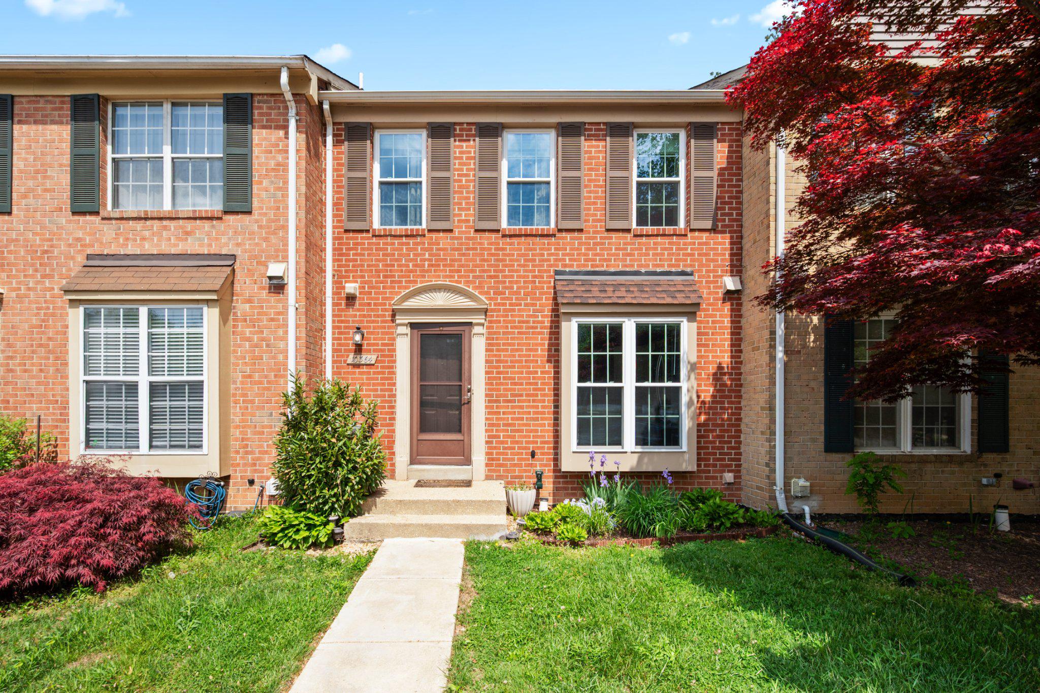 Nestled in the charming Forest Estates, this delightful Colonial townhouse offers a perfect blend of comfort and style. With 1,860 sq. ft. of thoughtfully designed living space, this home invites you to create lasting memories. The fully finished walkout basement provides versatile space for a home office, gym, or cozy entertainment area, complete with a convenient rear entrance. The inviting living room features a warm fireplace, perfect for cozy evenings. Enjoy the ease of parking with a dedicated space in the lot, ensuring convenience for you and your guests. The brick exterior adds timeless appeal, while the surrounding community offers a serene atmosphere for relaxation. This property is not just a house; it's a place to call home. With its blend of classic architecture and modern functionality, it's ready for your personal touch. Don't miss the opportunity to make this charming townhouse your own!