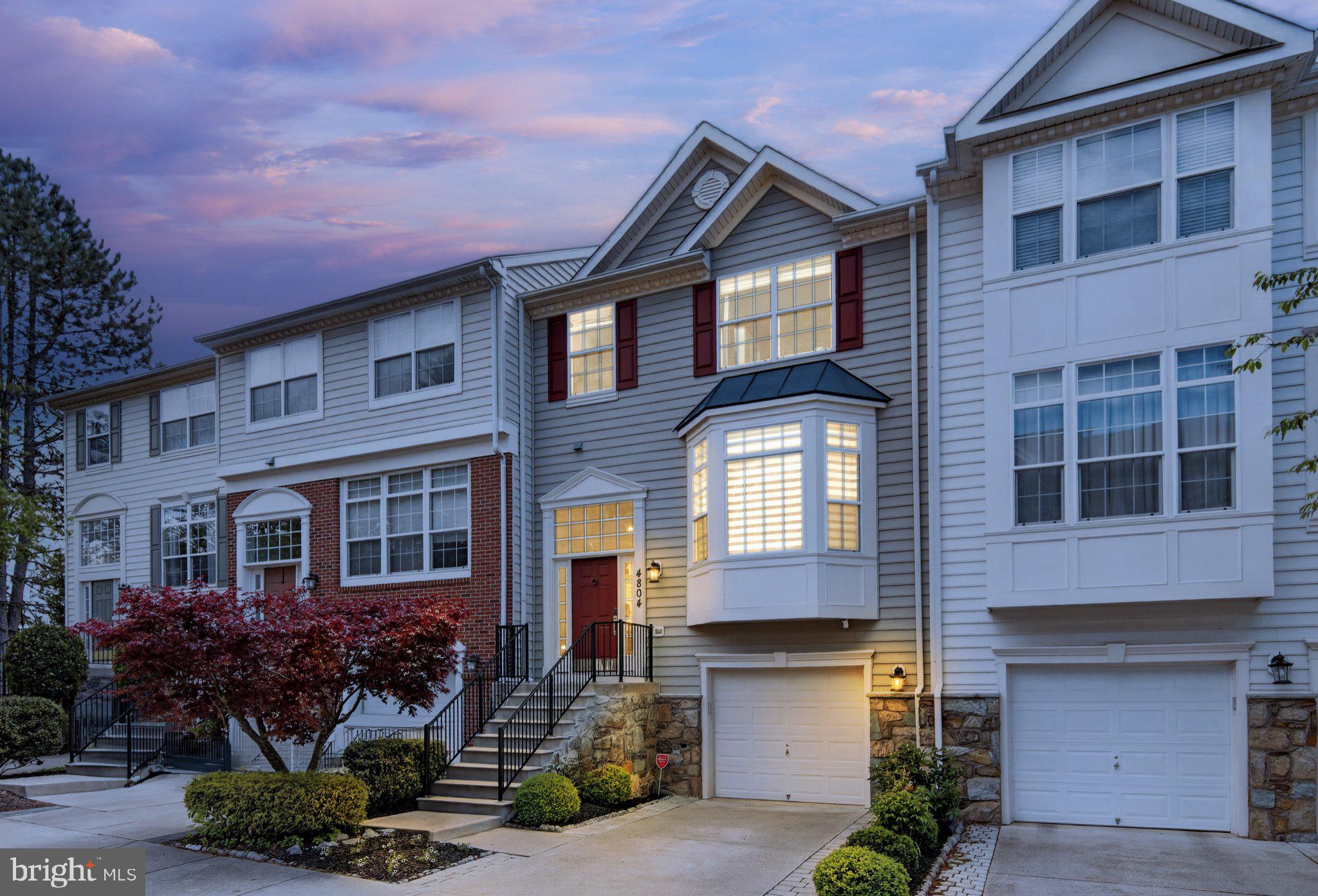 New Price- Enhanced Value! Move-in ready and beautifully maintained, this home now offers even greater value with the updated pricing.
Nestled within the prestigious Barnsley Manor Estates, this exquisite Colonial-style townhouse blends luxury, comfort, and modern convenience. Freshly painted and meticulously maintained, the home welcomes you with an open floor plan that seamlessly connects the living and dining areas—ideal for entertaining or everyday living. The family room and kitchen are the heart of the home, featuring a cozy fireplace, engineered hardwood floors, and stylish updated lighting that enhances the bright, contemporary feel. The gourmet kitchen is a chef’s dream, offering upgraded cabinetry, granite countertops, stainless steel appliances, and an expansive island, perfect for casual dining or entertaining. Step directly from the kitchen onto a private deck, ideal for al fresco meals or relaxing outdoors. Upstairs, discover three spacious bedrooms, including a luxurious primary suite with a spa-inspired bathroom featuring dual vanities, modern fixtures, a large walk-in shower, and a custom closet. The secondary full bath has been completely updated with new flooring, cabinetry, and finishes. The fully finished walkout basement offers a versatile open space, ideal for a recreation room, home office, gym, or play area, and includes a remodeled half bath with direct access to the private wood patio, perfect for outdoor dining or entertainment. Located in a quiet, low-traffic setting, this home offers easy access to parks, shopping, dining, and commuter routes. Public transportation is nearby, and the suburban location combines tranquility with convenience. Every detail has been thoughtfully updated for modern living. From the gourmet kitchen and deck to the spa-inspired baths, finished basement, and private outdoor space, this home is truly turnkey. Your dream home awaits in Barnsley Manor Estates, where comfort, style, and convenience meet.