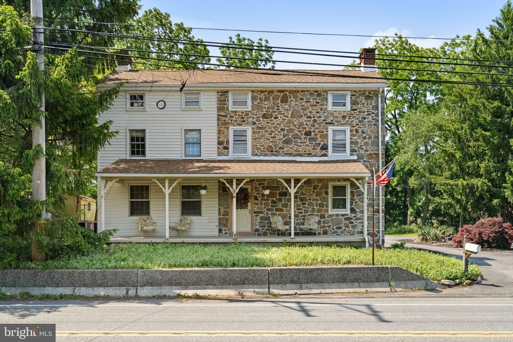 If you have been romanticizing living in an 1830 Farmhouse, here is your chance! Welcome to 3171 Foulk Road. This 4 bed, 2 bath farmhouse has the character, charm, and soul that only an older home can offer. It’s the kind of house the second you walk in, you know this home is special. The front porch is made for slow mornings and coffees, the acre and a half is ready for gardens and gatherings, plus a barn full of possibility. This is the kind of property where you can dream a little and then make it your own! One of the best parts of this farmhouse is that it gives you the charm of a historic home without asking you to give up modern conveniences, it’s been updated (yes it has central air, public sewer, and public water)! Set along Foulk Road, you’re not tucked away from life, you’re connected to it. It’s the kind of home you feel proud of when you drive up and pull into your circle driveway. The first floor features the coziest, most romantic dining room you’ve ever seen with original stone and beams. It’s connected to the kitchen and living room which is perfect for everyday dinners or hosting dinner parties. There’s even a wall where the previous owner used to hang dried flowers from the garden, a sweet little detail that adds to the home’s story. With a wood-burning stove and so much warmth already built in, you can almost picture it dressed for the holidays, candles glowing, greenery on the table, and everyone gathered close.  Just off the kitchen, the living room brings its own sense of warmth and character. The stone detail gives the space texture and charm, making it feel cozy, grounded, and inviting. The kitchen has its own little moments, too. The counter is the kind of place where someone can pull up a seat while dinner is being made, or where you can set out snacks when friends and family are over.  There is a door leading right out to the backyard, making it easy to imagine summer evenings, grilling, and bonfires.  Upstairs, the primary bedroom connects directly to a spacious laundry room and full bath, making everyday life feel easy. What makes this space even better is the second oversized closet and an additional doorway that leads back out to the hallway, giving the layout a really functional flow. There’s also a second bedroom with its own fireplace, adding even more charm and history to the home. While the fireplace is not currently working, it still brings so much character to the room. And then there’s the custom-painted floor, left behind by the creative previous owner, one of those unexpected details that makes this farmhouse feel personal, lived-in, and truly one of a kind. The third floor gives you even more room to imagine how this farmhouse could fit your life. At the center is a large closet, framed by two additional bedrooms on either side. It’s the kind of space that can grow and change with you, extra bedrooms, a quiet home office, a creative art studio, a playroom, or a cozy hideaway tucked upstairs. In the unfinished basement you’ll find plenty of room for extra storage, with easy access from inside and outside. And then there’s the 2 story Barn, the piece that makes you start dreaming even bigger. Maybe it becomes a workshop, a studio, extra storage, a gym, or the backdrop to whatever hobbies and projects come next. Move in just in time to watch the fireflies in your new backyard this summer! Close to shops, schools, restaurants, and everything Garnet Valley has to offer, this is a home that feels full of history while still fitting beautifully into real, everyday life.