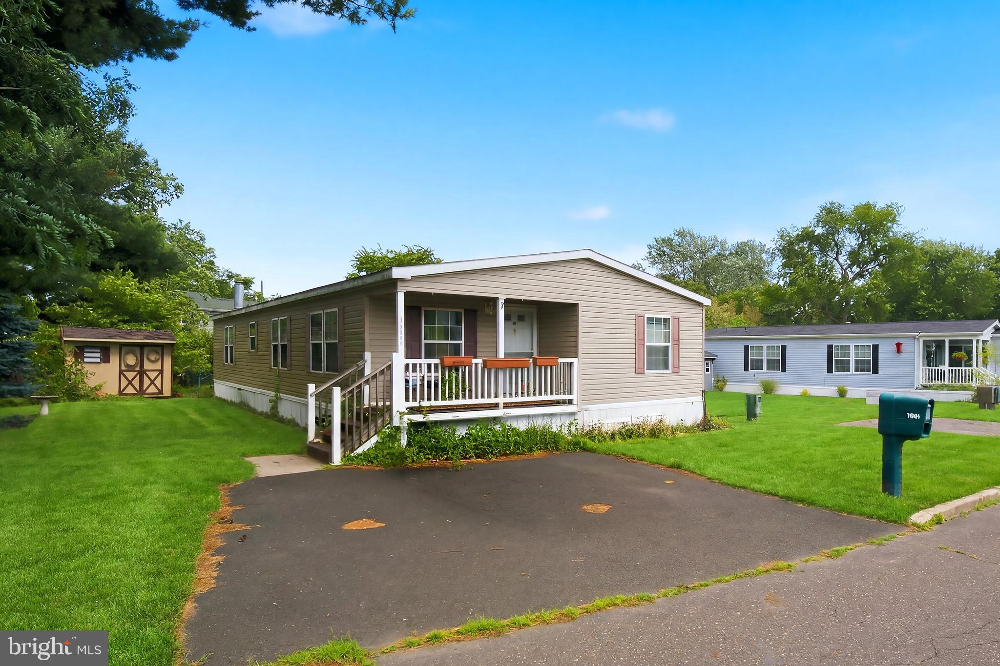 Welcome to 7001 Huber Drive in Pennwood Crossing, Morrisville, PA! Situated on a desirable corner lot, this well-maintained manufactured home offers 3 bedrooms and 2 full bathrooms with a comfortable and functional layout. Enjoy spacious living areas, plenty of natural light, and the convenience of single-floor living. Whether you're looking to downsize or purchase your first home, this affordable property provides a wonderful opportunity to enjoy all that Pennwood Crossing has to offer. Schedule your private tour today!