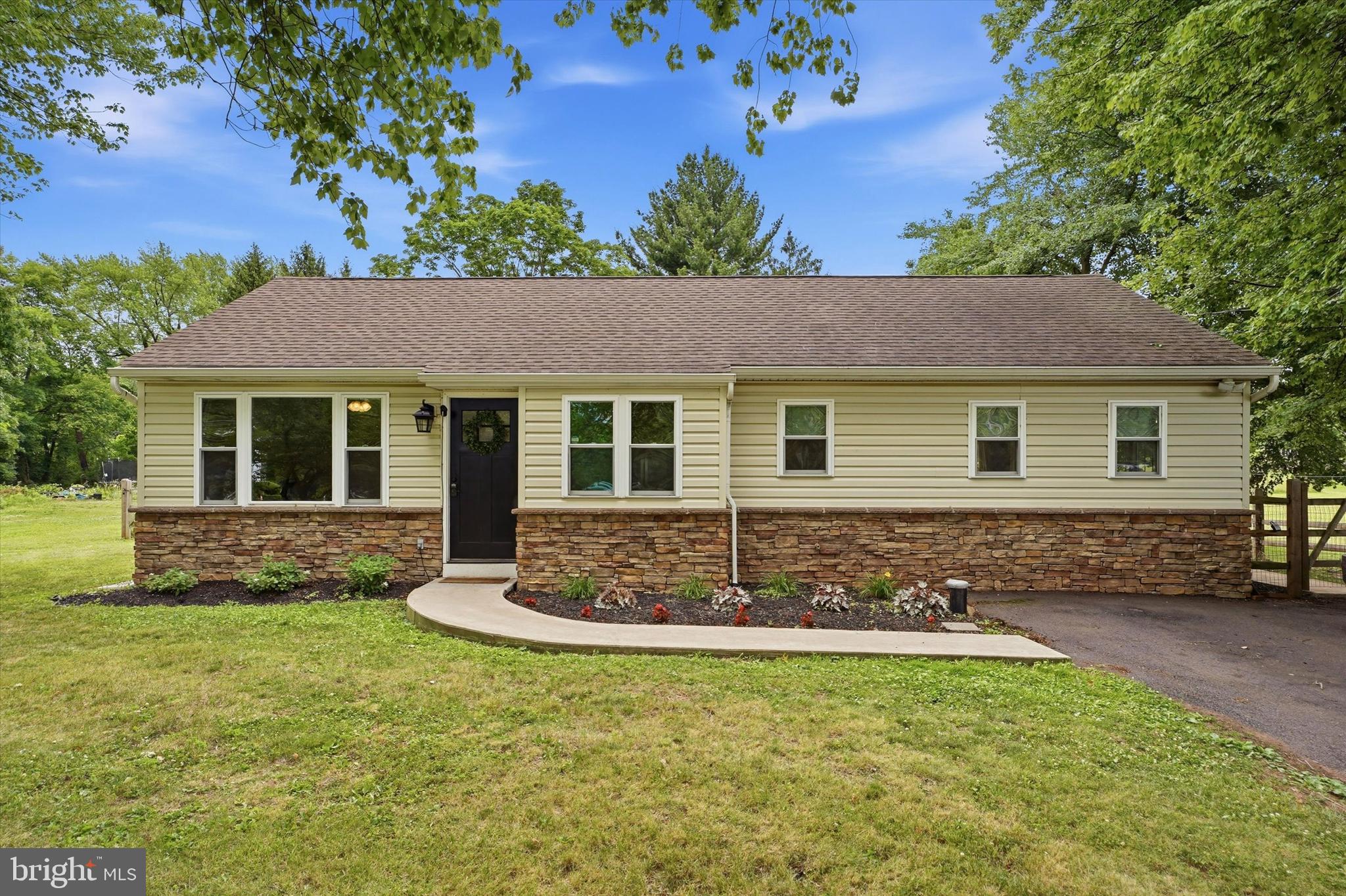 Welcome to 383 Bethel Church Rd - single-level living on a beautiful plot of land in Spring City! Here you have your own slice of nature, still within a very accessible location to major highways, shopping, and vibrant towns! The main entryway opens nicely to a flexible bonus room (current office space) on your left and kitchen on the right. The open kitchen provides full access to the main level, with the dining area and additional sitting room just steps away. The large living room sits in the center of the home, offering plenty of space for the entire family or the perfect gathering place for special occasions. Down the hall you will find three bedrooms, all with access to a full bathroom from the hallway. There is also plumbing available for a future primary bathroom. Just outside of your door your beautiful fenced in backyard awaits! The perfect place to enjoy a quiet morning or evening sunset.  There is also a large unfinished basement, perfect for storage.  This home was custom rebuilt in 2018, just before the current owners purchased in 2020. Several recent updates include: Roof, central heating and cooling, propane high-efficiency hot water heater, water pressure tank, refrigerator, washer, dryer, and gas range (2019), new septic system (2020), new well pump, dishwasher, and generator input outlet (2023).