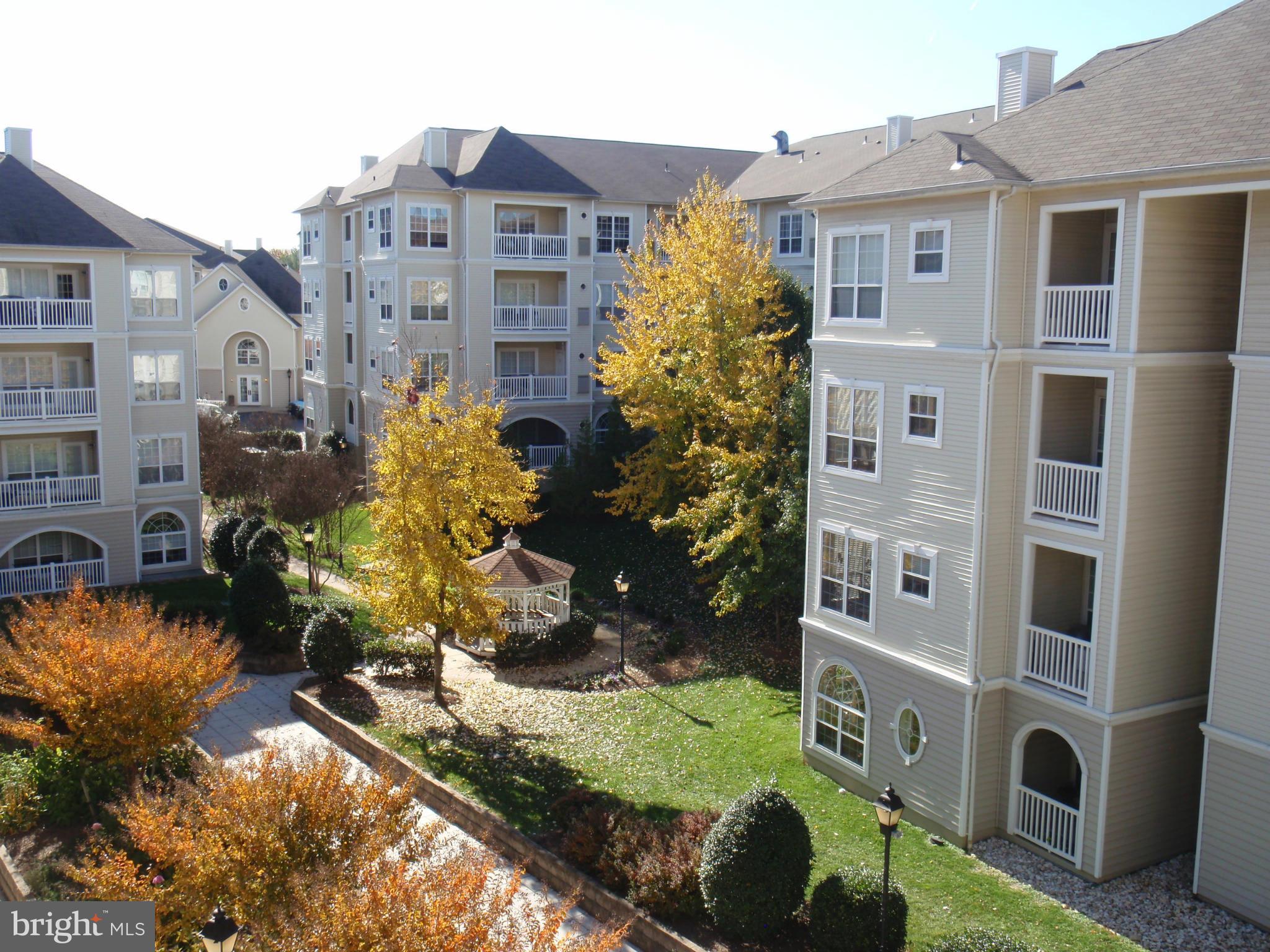 BEAUTIFUL TOP FLOOR 2BR  2BA + DEN UNIT W DECK OVERLOOKING COMMON AREA!! STAINLESS STEEL APPLIANCES & GRANITE COUNTER TOPS! WOOD FLOORS IN LR & DR! VAULTED CEILING! GAS FIREPLACE! OPEN FLOOR PLAN. 2 GARAGE PARKING PLACES! FULL SIZE W/D. NO PETS / SMOKING. CREDIT CHECK FEE $55 PER ADULT & 1ST MONTH'S RENT TO LONG & FOSTER. APPLY ONLINE . CERTIFIED FUNDS REQUIRED.  GOOD CREDIT & MAX 2 INCOMES TO QUALIFY. AVAILABLE JUNE 14, 2025 .  MAY BE AVAILABLE SOONER. CALL LISTING AGENT.   PARK ON N HAMPTON OR IN THE GUEST SPACES NEAR THE OFFICE.  TOWING ENFORCED IN THE GARAGE 24-7. DO NOT PARK IN THE GARAGE VISITORS' PARKING PLACES WITHOUT  PARKING PASS.