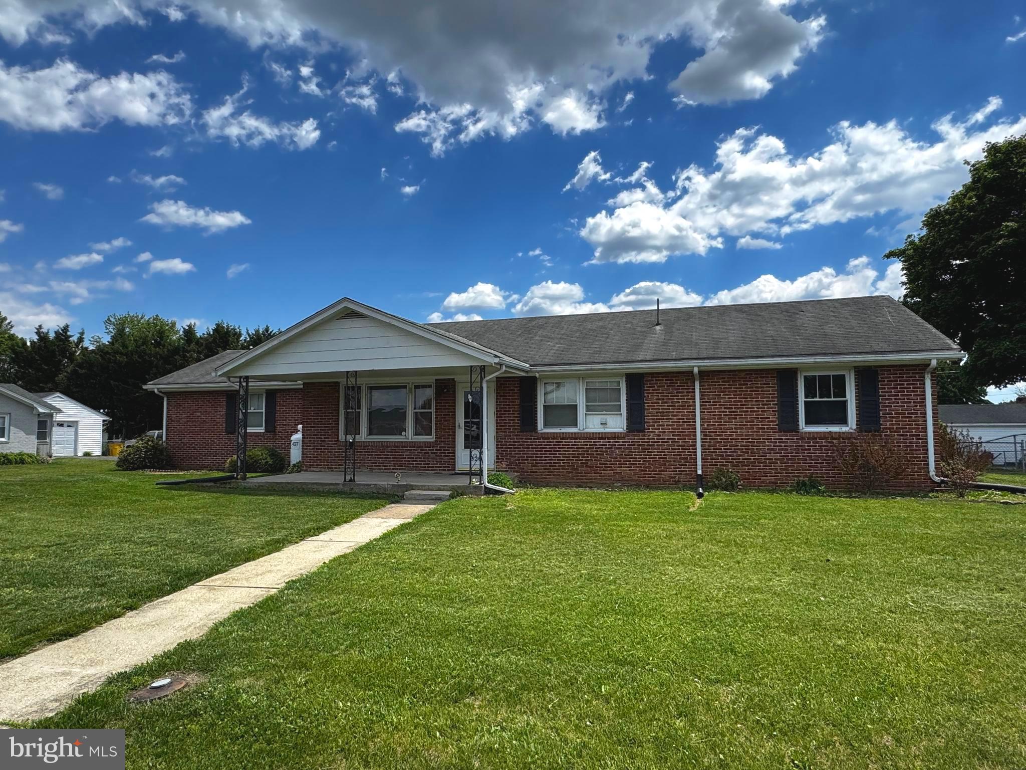 Brick rancher on a nice fenced corner lot! This 3-bedroom, 2-full-bath home features hardwood floors, updated bathrooms by Bath Fitter, a two-car side-entry garage, full basement, electric baseboard heat, and an enclosed rear porch. A spacious outbuilding offers great storage for lawn and garden equipment.

Please note: There is a foundation issue. A report and details on corrective measures taken are included in the document section of the listing.

This home is ready for your personal touch!