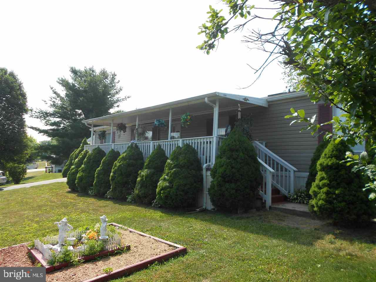 Beautiful Double Wide that has been painstakingly maintained by owner.  Some nice updates which include newer C/A and furnace (2015).  Great covered front porch and plenty of room are some of the nice features of this home.  Lovely landscaping and storage shed too.  Hurry!!!