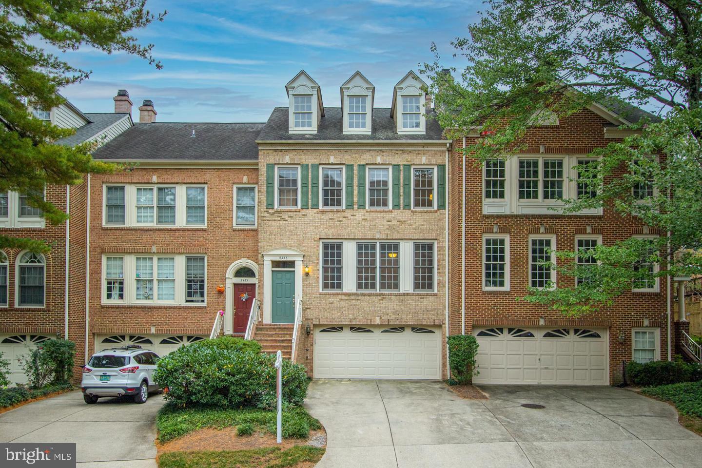 Welcome to 5453 Whitley Park Terrace, a fantastic row home perfectly situated in Bethesda, Maryland. Boasting over 2,700 square feet of space over three levels, this home offers a fabulous floorplan for comfortable living.

As you enter the home, you will immediately notice the beautiful hardwood flooring in the dining and living area, providing a warm and welcoming atmosphere. Natural light beams through the oversized windows and custom trim work and chair-rail molding can be seen throughout. The kitchen features stainless steel appliances and beverage refrigerator, tile flooring, granite countertops and custom tile backsplash, making this the perfect space to host and entertain. The kitchen is conveniently connected to the deck, providing an ideal space for outdoor dining and relaxation.

Follow the designer carpet upstairs where you will find three bedrooms and two full bathrooms. The generously sized primary suite offers a luxurious and spacious loft with a fireplace and built-in cabinetry, providing the perfect space for relaxation and tranquility. Additional storage space can also be found tucked behind the side doors. The primary bathroom features an oversized tub, jetted shower, custom-tile walk-in shower, and dual vanities, offering a spa-like experience. The spacious walk-in closet with built-in shelving provides ample storage for your wardrobe and accessories. 

The lower level offers an additional living area with a cozy fireplace and beverage refrigerator, perfect for lounging. This level connects to the two-car garage and offers a walkout to the patio space. A washer/dryer and full bathroom round out this level, providing ease and convenience.

This wonderful row home is a must-see and is sure to impress. Enjoy the endless amenities this community has to offer including the fitness center, outdoor pool, tennis courts, playground, community room and library, all just steps away. Minutes away from I-495, I-270, multiple metro stations, downtown Bethesda and endless shops and restaurants, this home could not be more ideally situated. With all this beautifully maintained home has to offer in such a prime location, it will surely not last. Don’t miss out on this opportunity to call Whitley Park home.